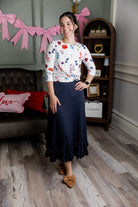 Model wearing Nuggles® Callie Skirt in Navy modest skirt