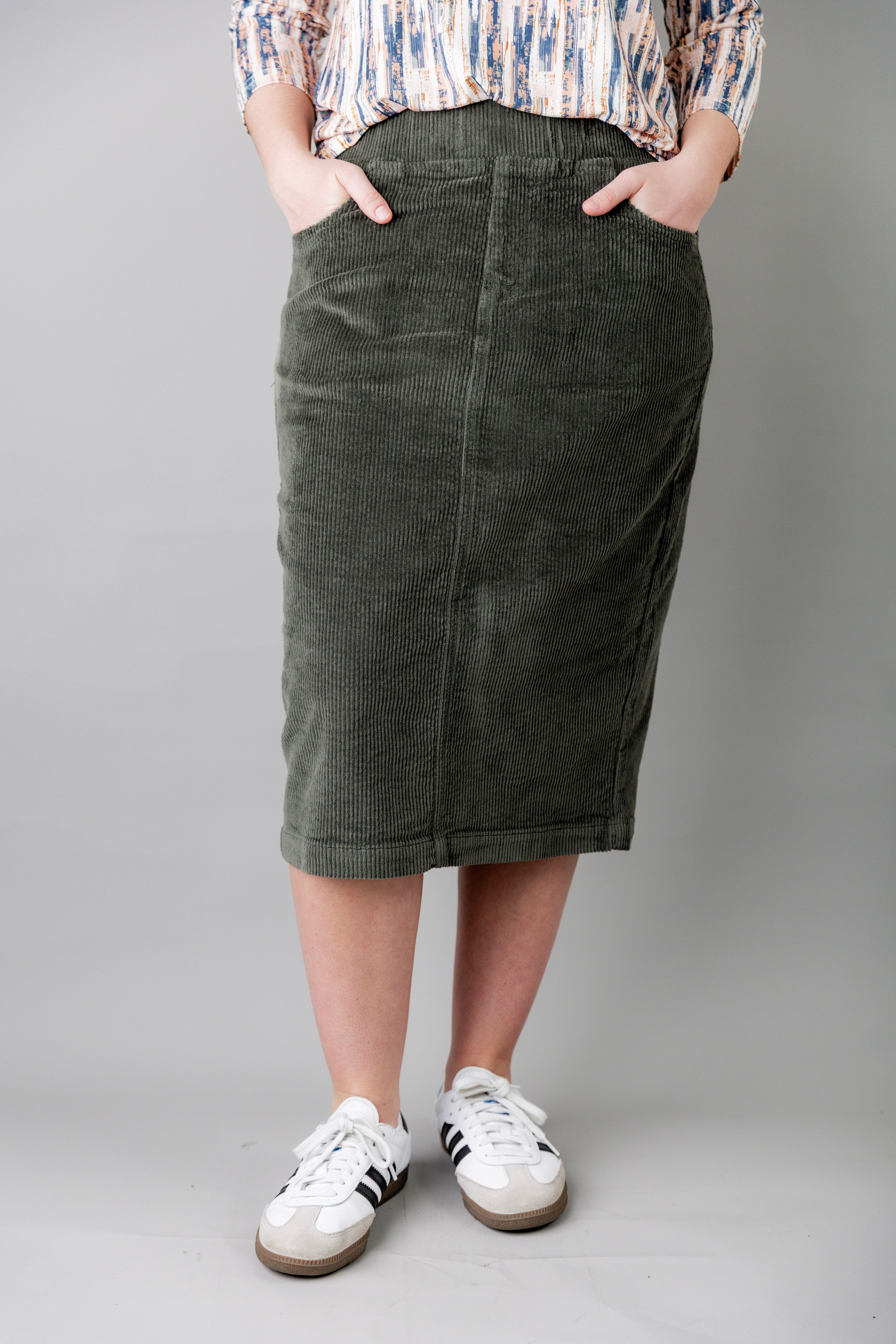 Model wearing Nuggles® 27-inch corduroy skirt