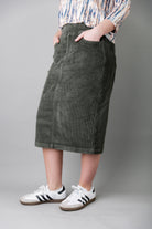 Model wearing Nuggles® 27-inch corduroy skirt