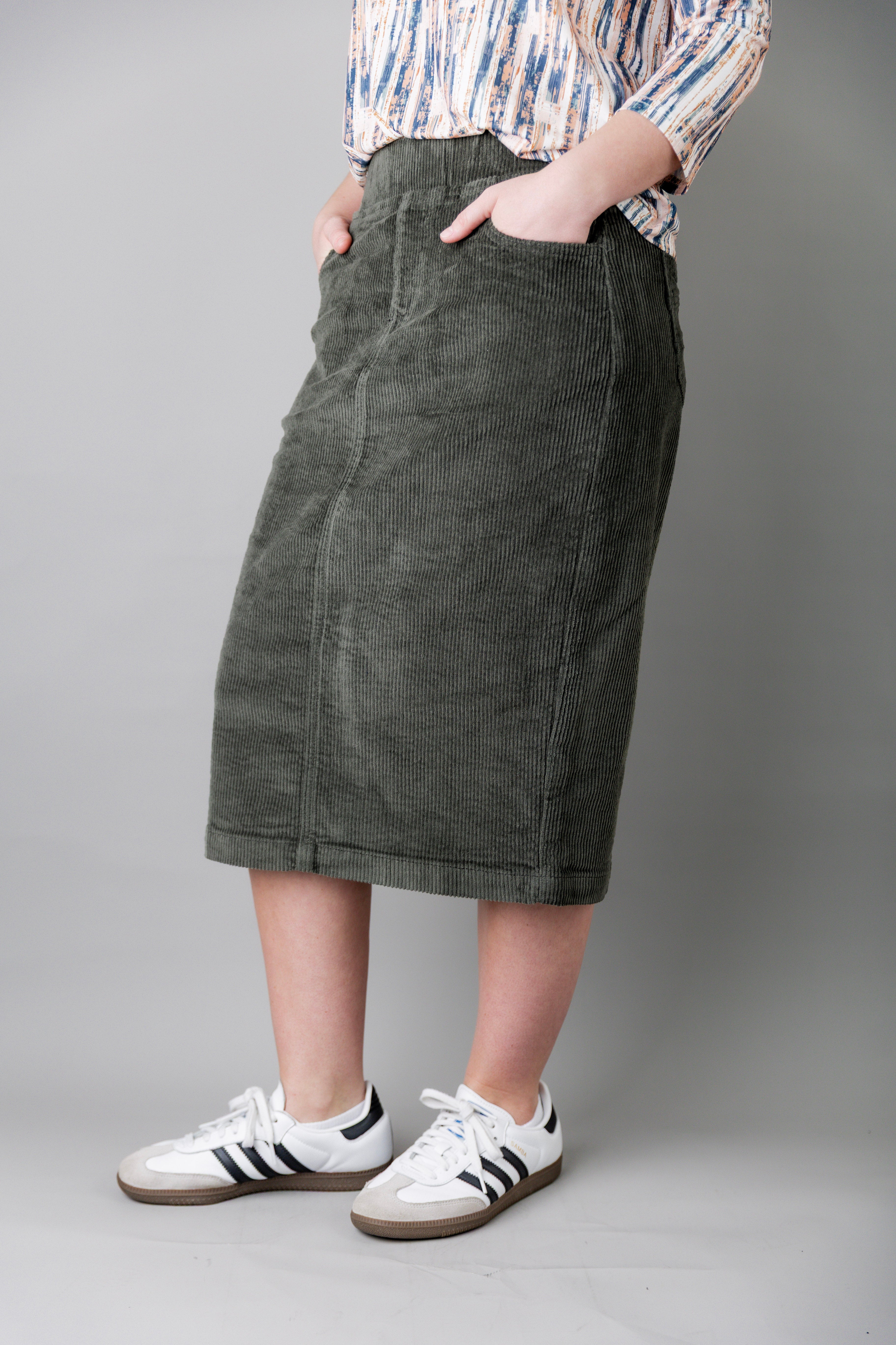 Model wearing Nuggles® 27-inch corduroy skirt