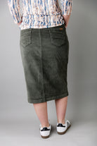 Model wearing Nuggles® 27-inch corduroy skirt