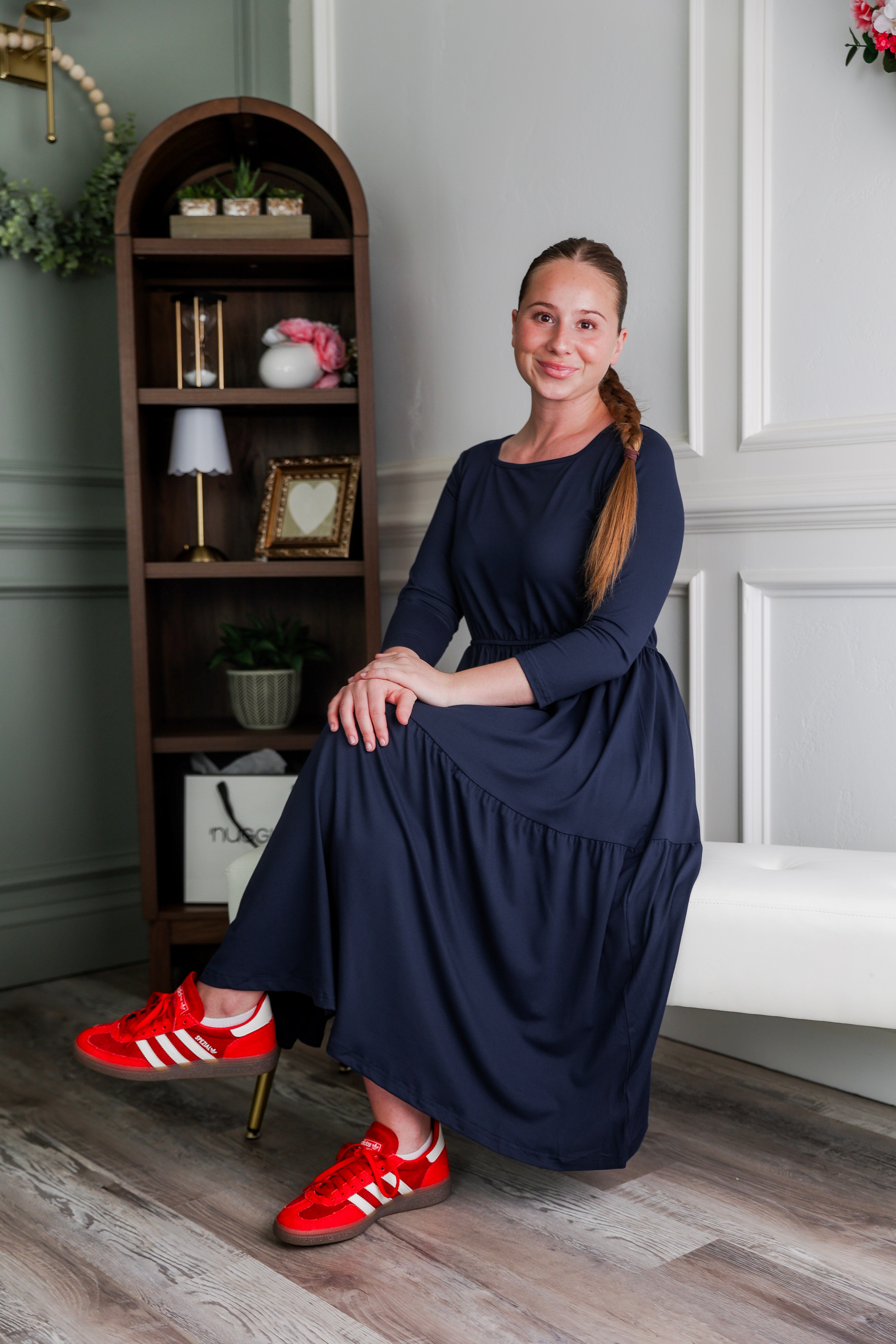 Model wearing Modest Nuggles® Nova Dress in Navy