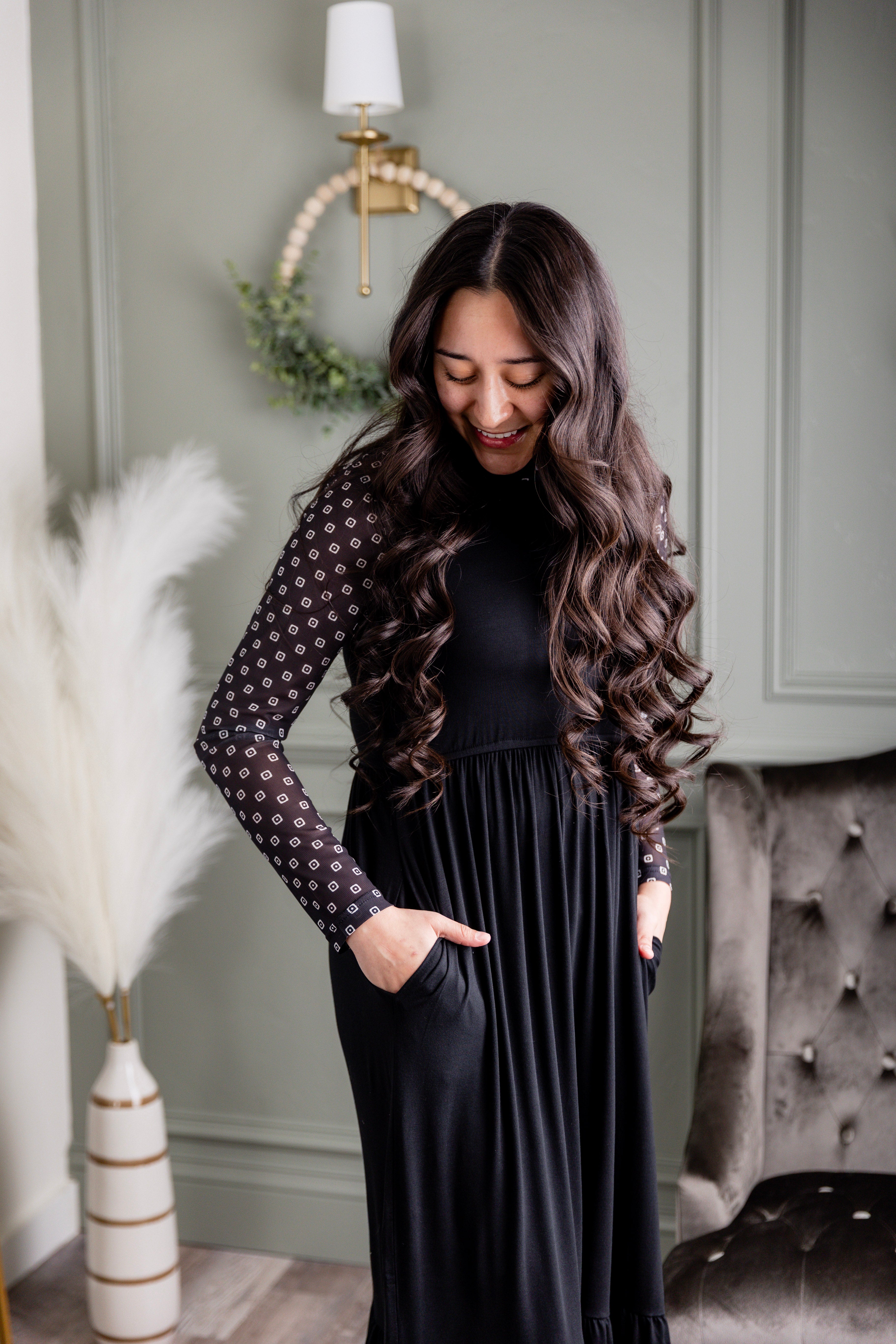 Model wearing the Nuggles® Riley Dress in Black