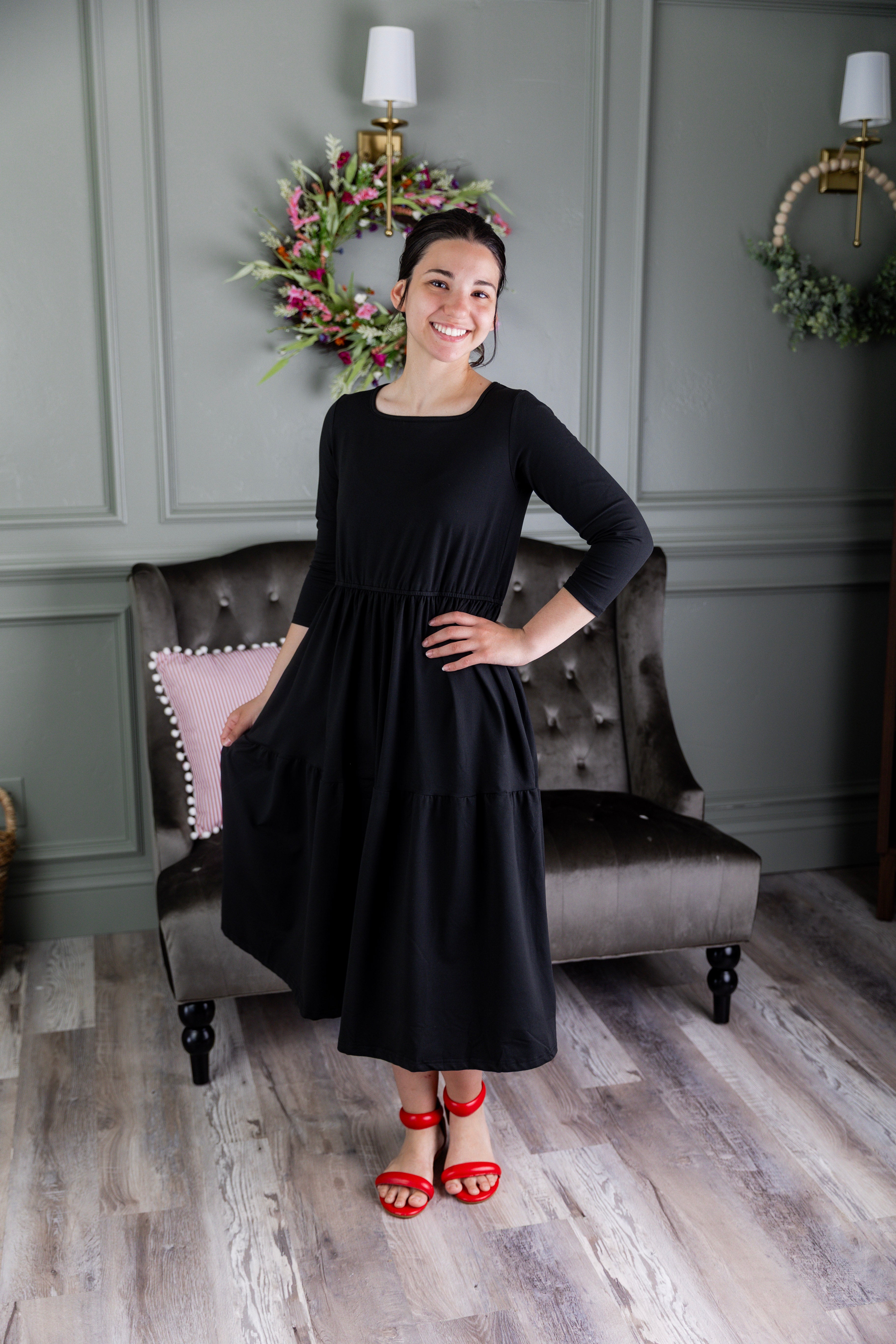 Model wearing Modest Nuggles® Nova Dress in Black