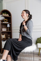 Model wearing Nuggles® 31" All-Sport Skirt in Black