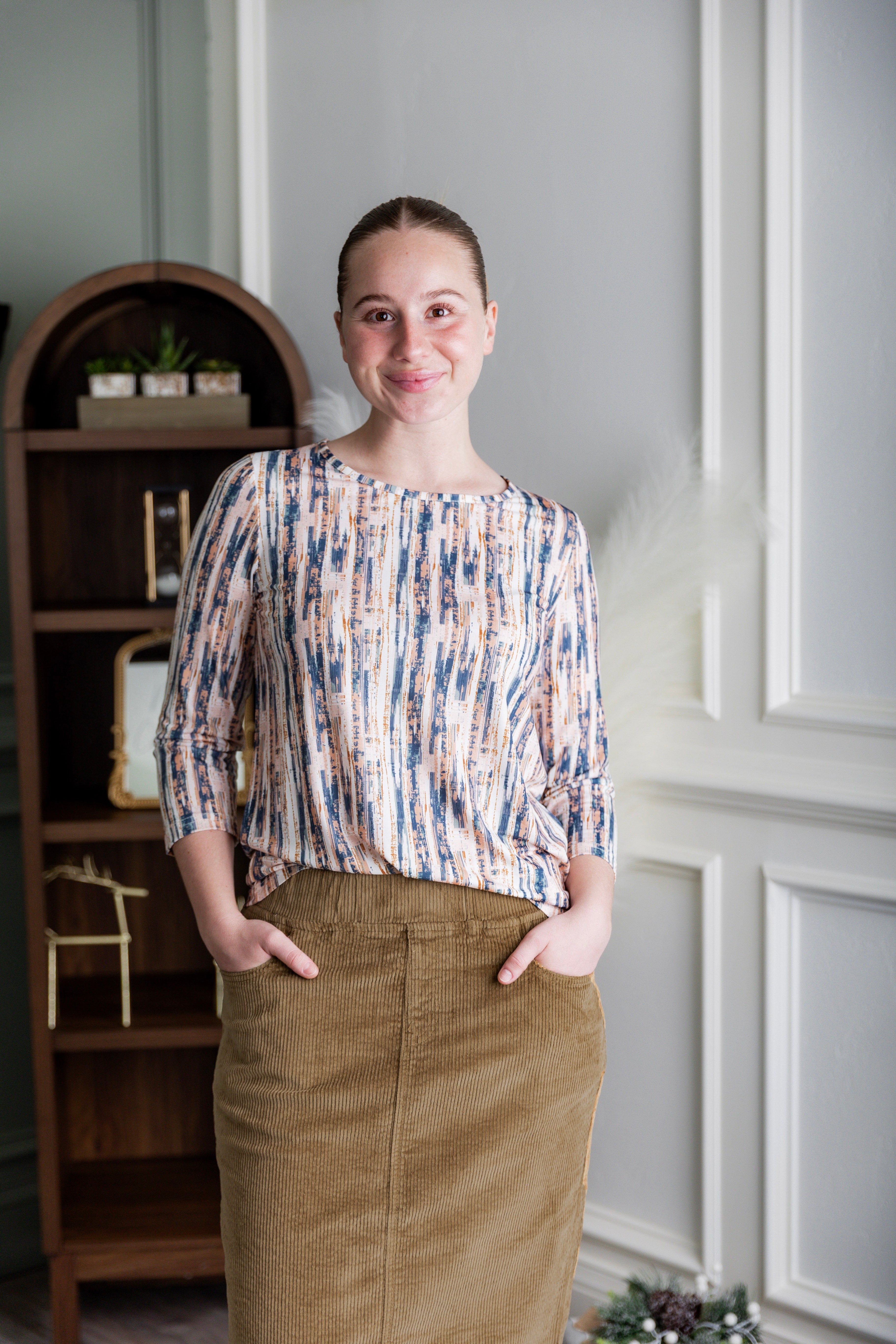 Model wearing Nuggles® 27-inch corduroy skirt