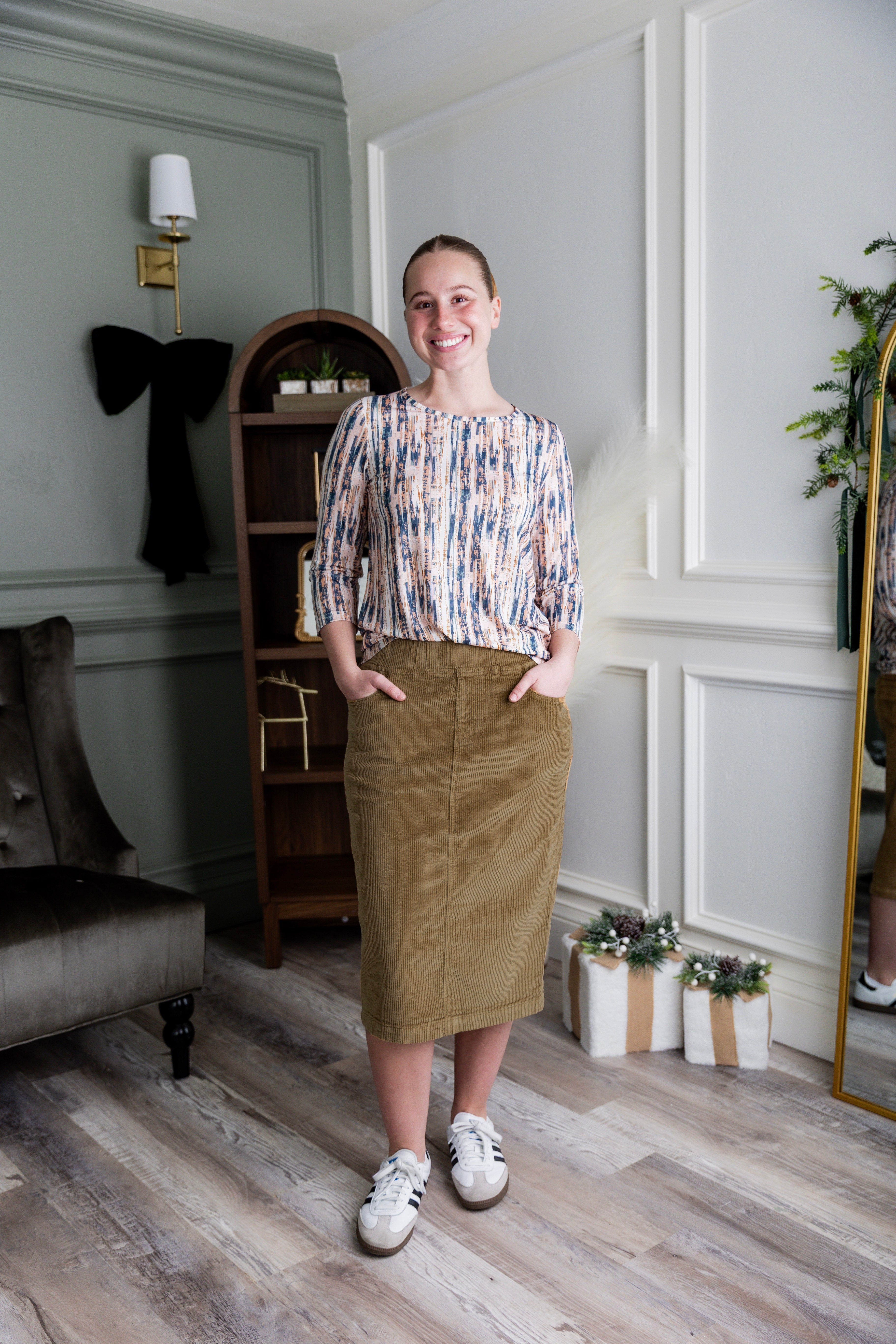 Model wearing Nuggles® 27-inch corduroy skirt