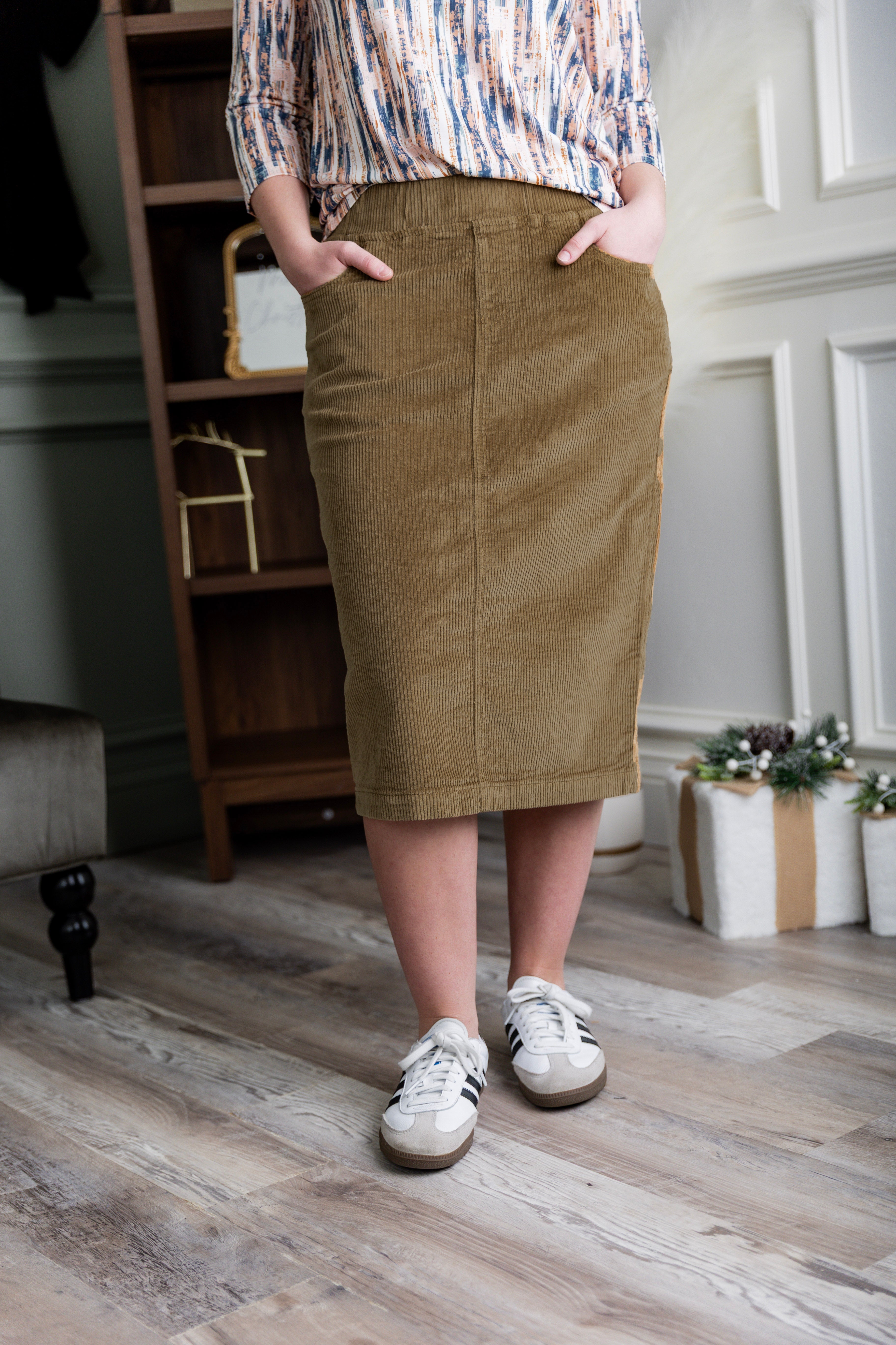 Model wearing Nuggles® 27-inch corduroy skirt