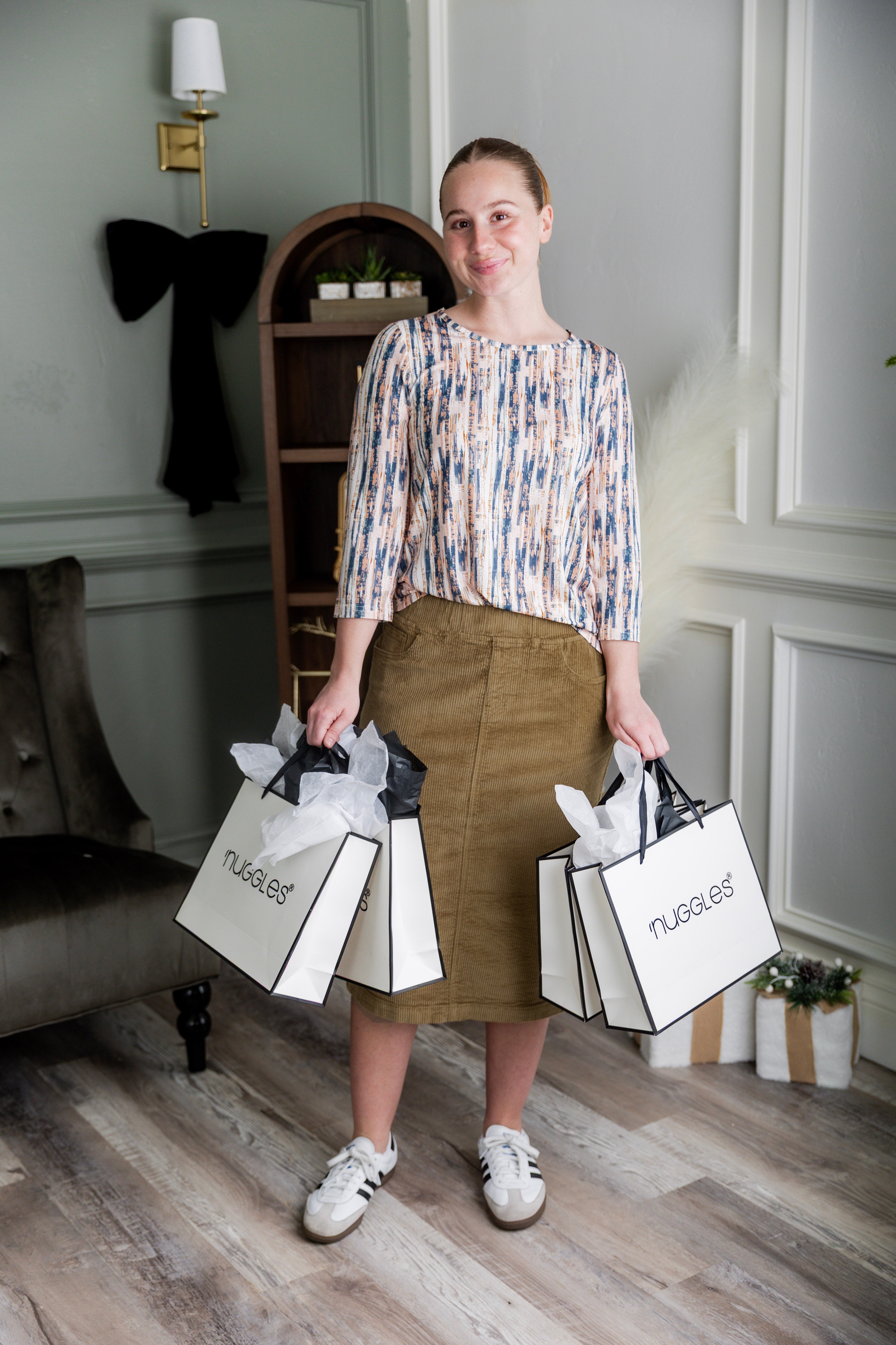 Model wearing Nuggles® 27-inch corduroy skirt
