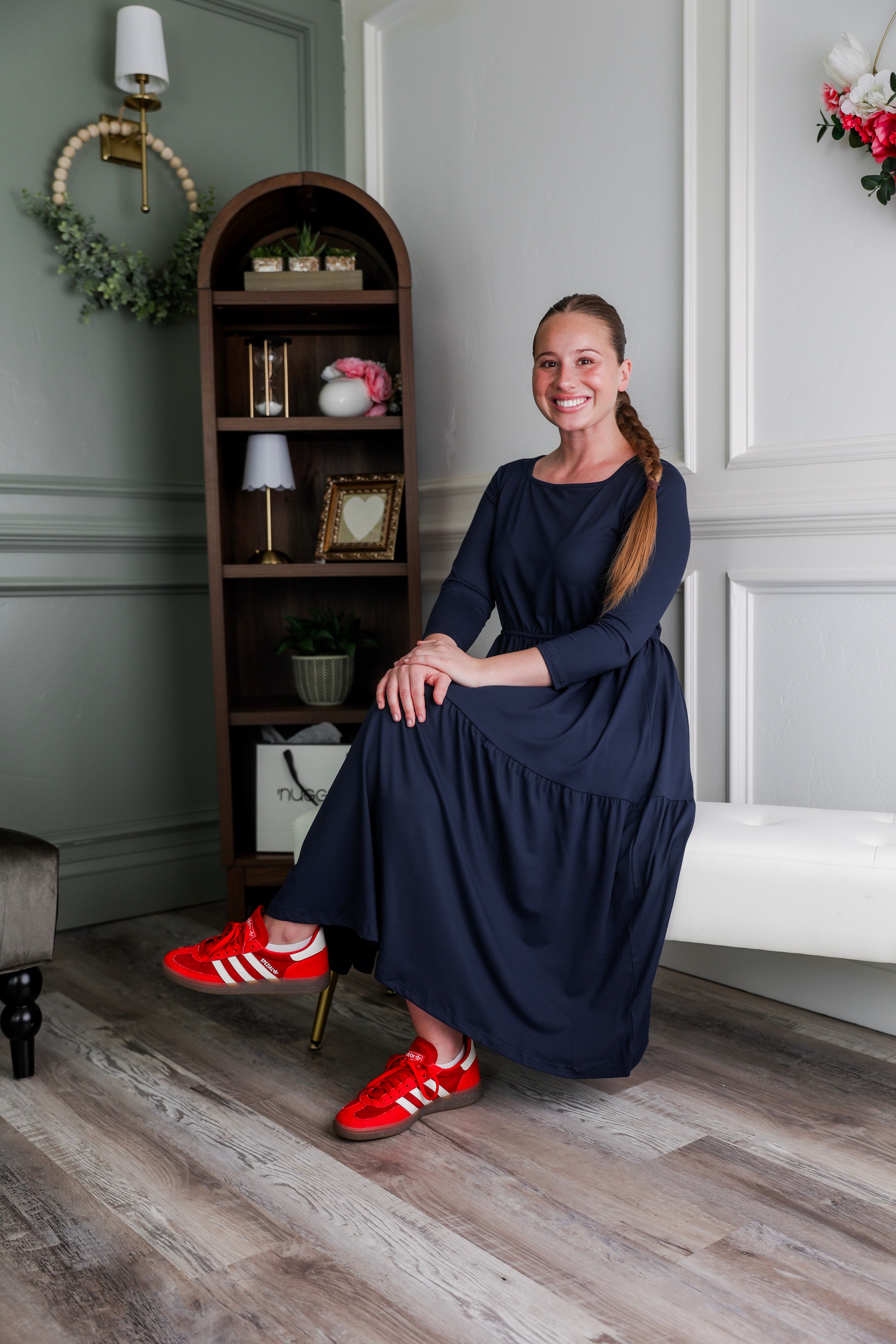 Model wearing Modest Nuggles® Nova Dress in Navy