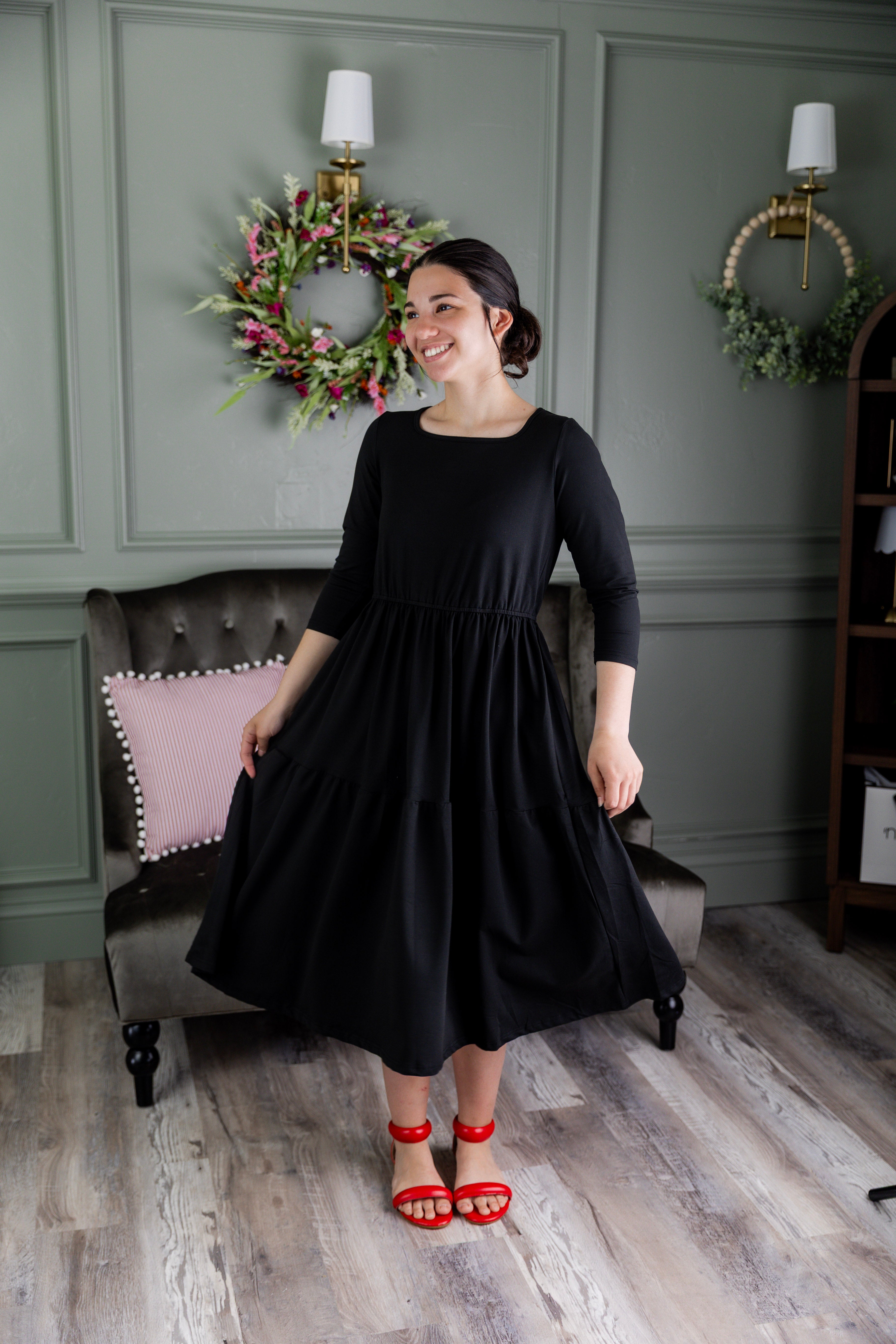 Model wearing Modest Nuggles® Nova Dress in Black
