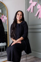 Model wearing Nuggles® Eleanor Top in Black