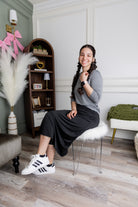 Model wearing Nuggles® 31" All-Sport Skirt in Black