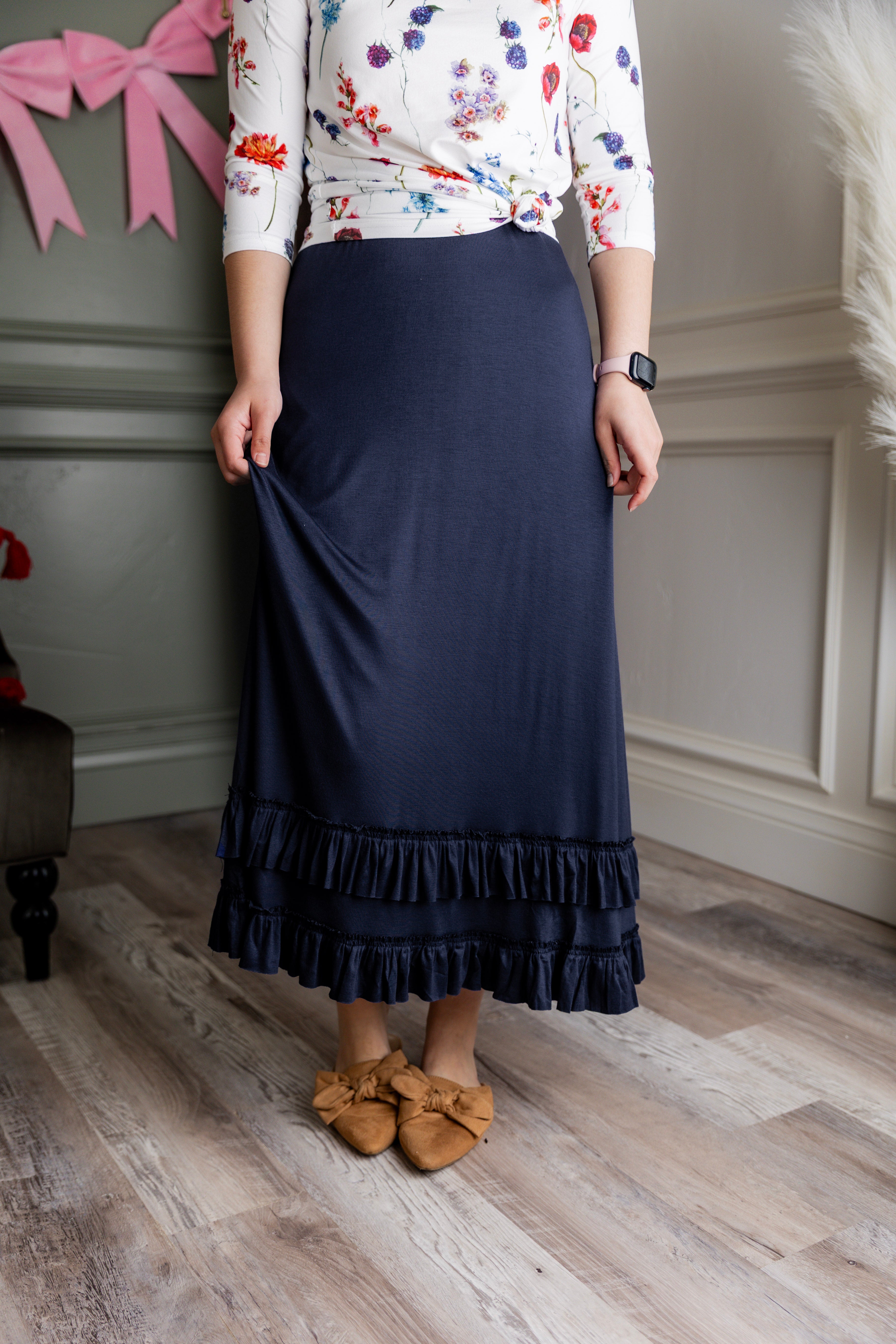Model wearing Nuggles® Callie Skirt in Navy modest skirt