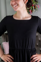 Model wearing Nuggles® Nova Dress in Black 