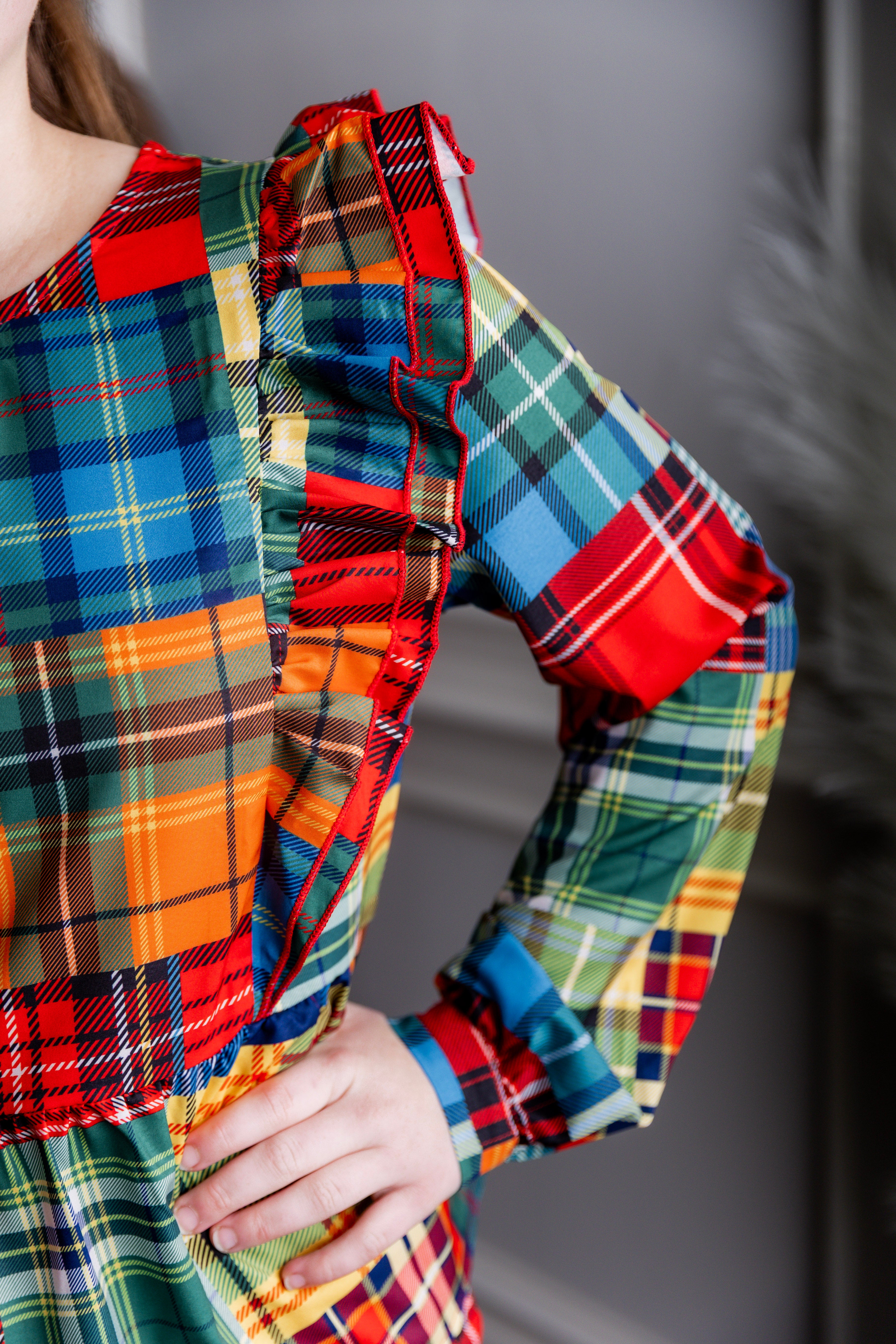 Model wearing Nuggles® Rae Top in Patch Plaid