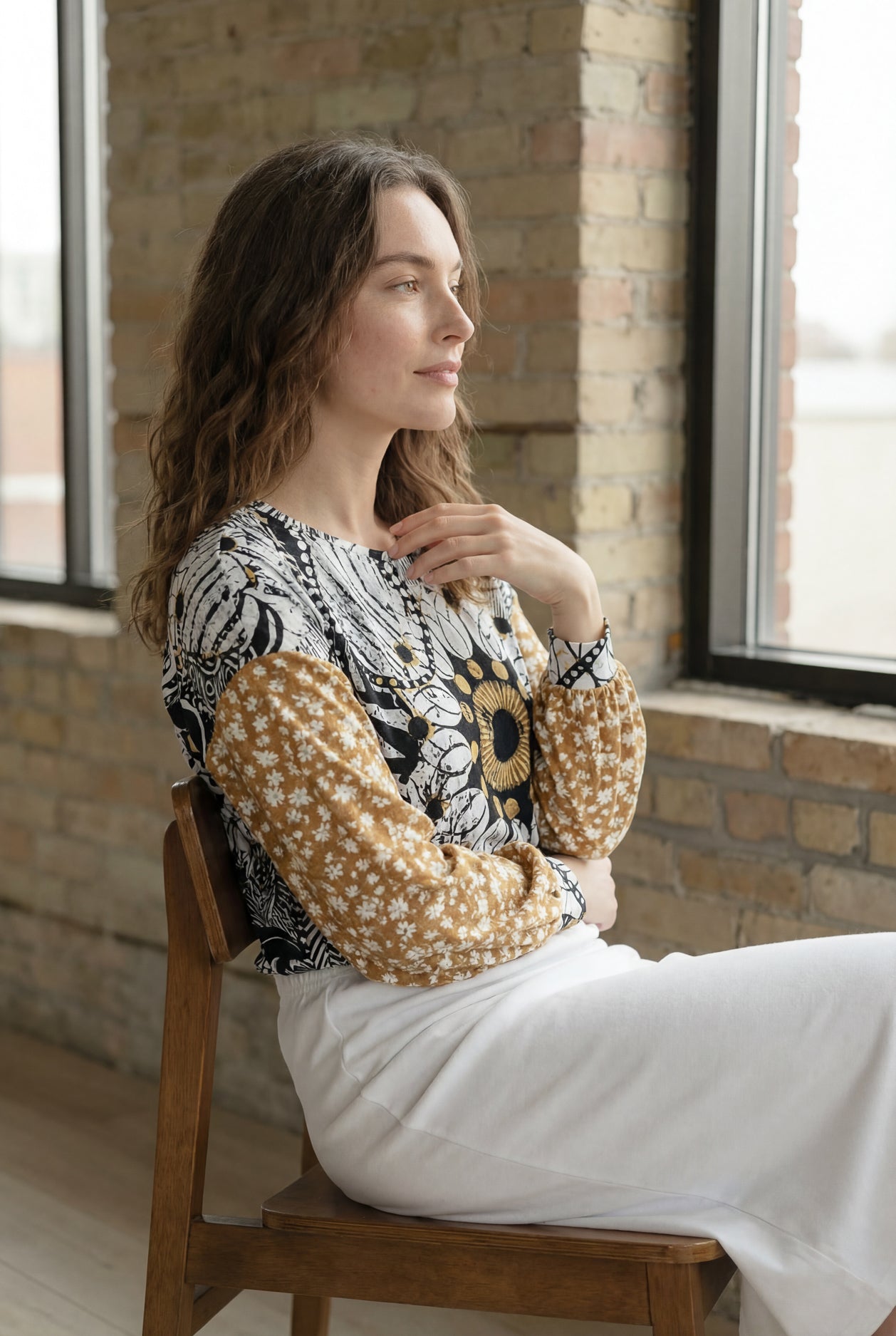Model wearing the Nuggles® Bryauna Top in Sunlit Collage