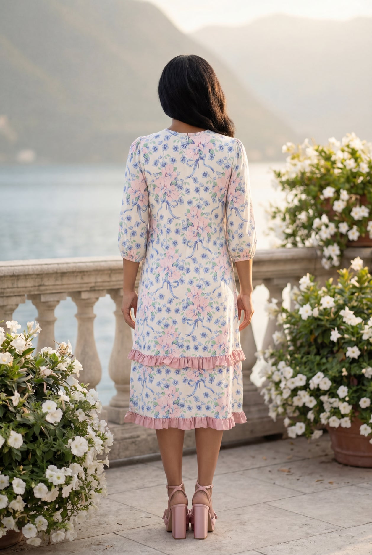 Model wearing Nuggles® Patricia Dress in Roselight Bloom