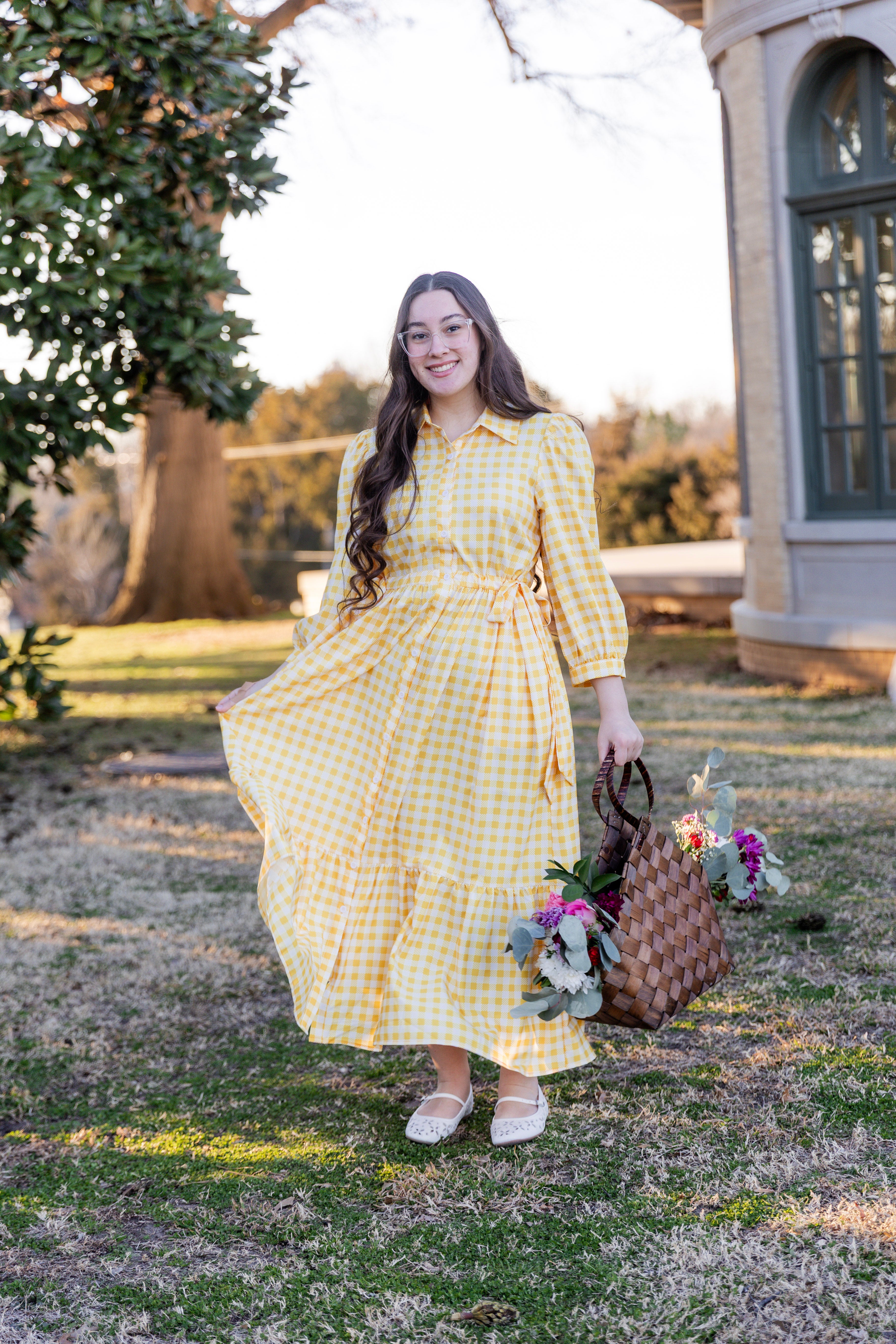 Model wearing the Nuggles® Leila Dress in Sunshine Check