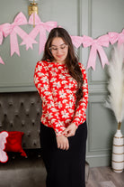 Model wearing Nuggles® Essential Long Sleeve Tee in Red Petal Party