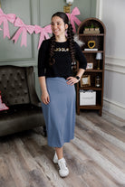 Model wearing Nuggles® 31" All-Sport Skirt in Baby Blue