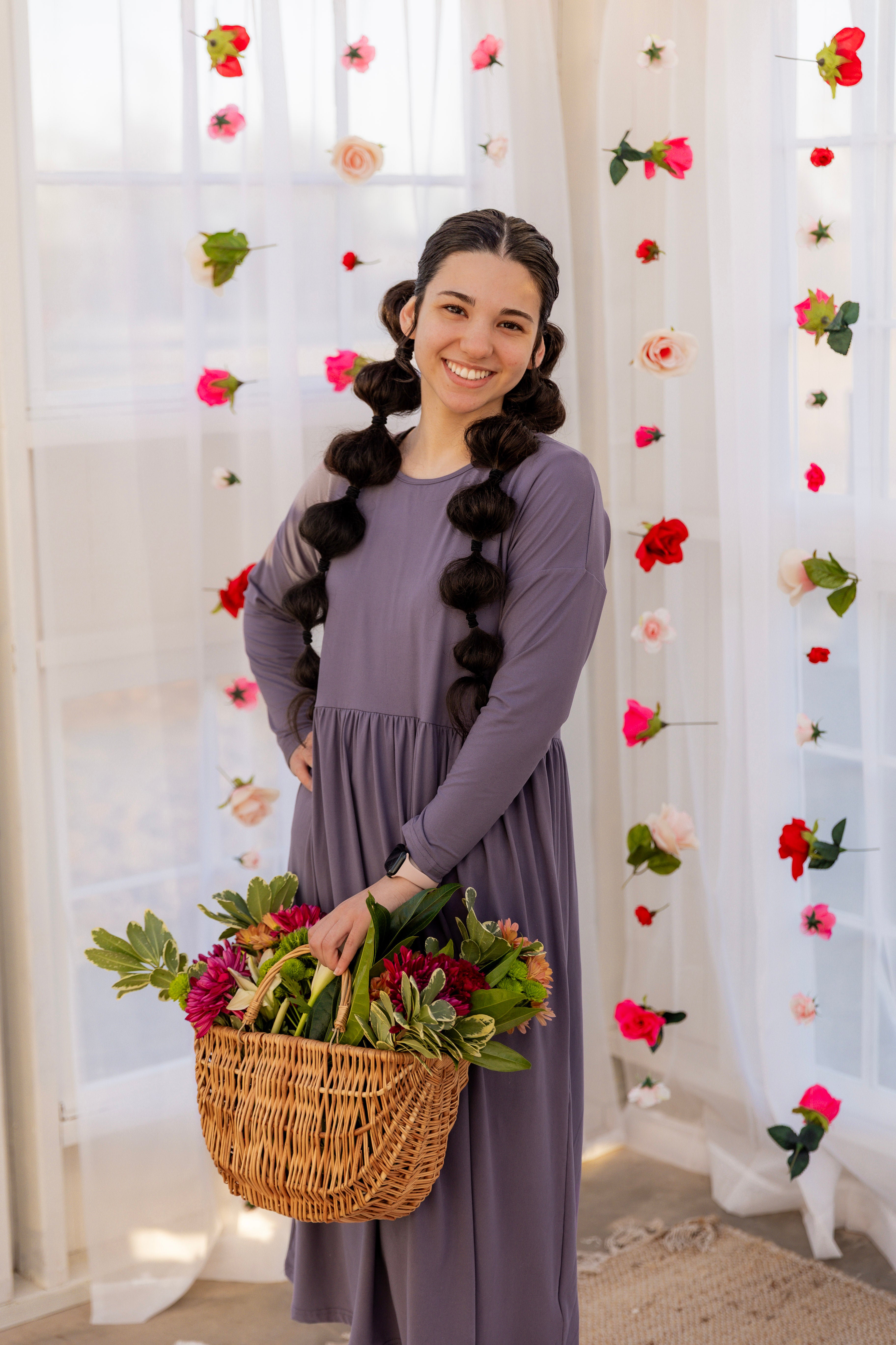 Model wearing the Nuggles® Farah Dress in Purple