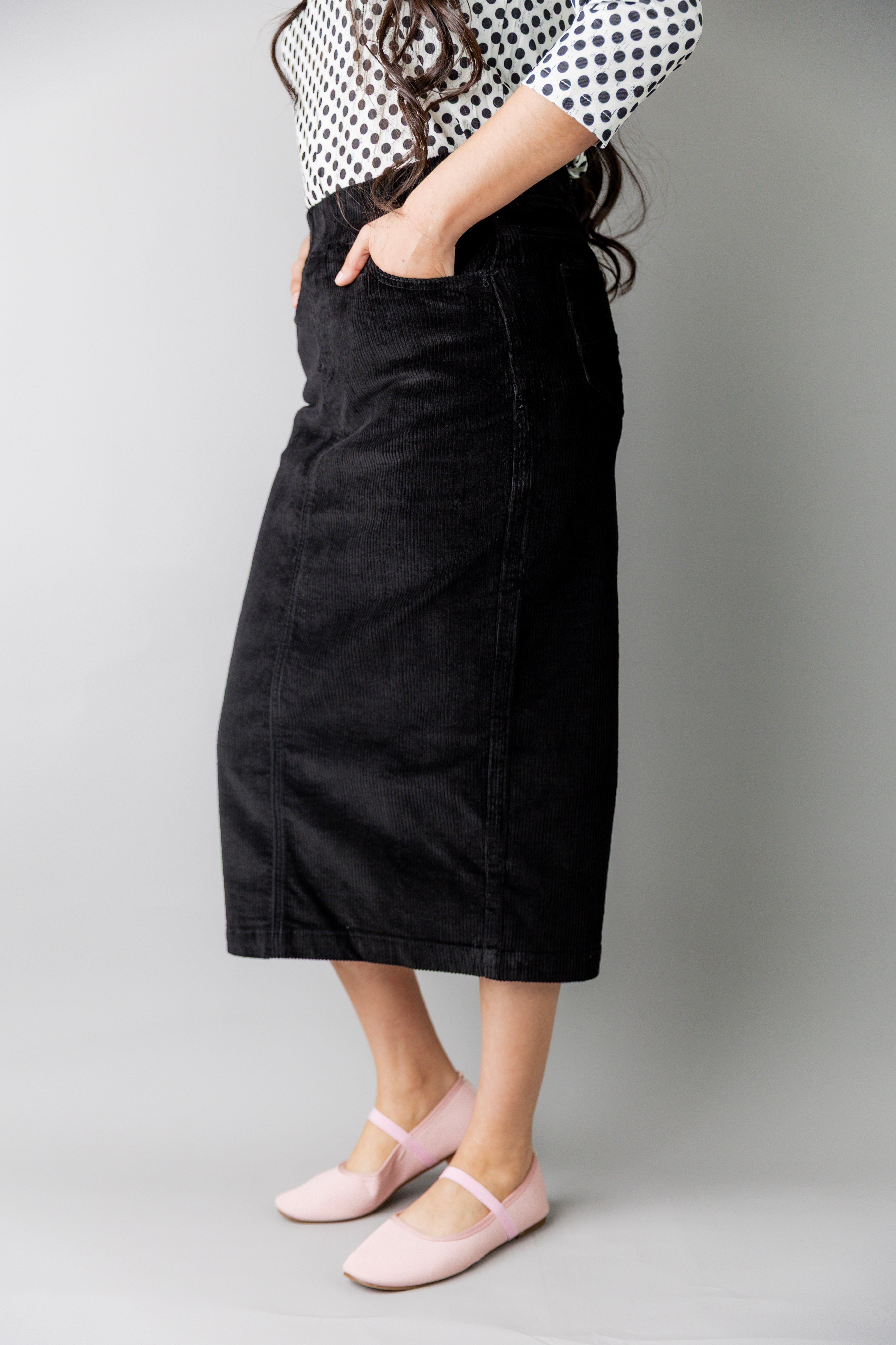Model wearing Nuggles® 31-inch corduroy skirt