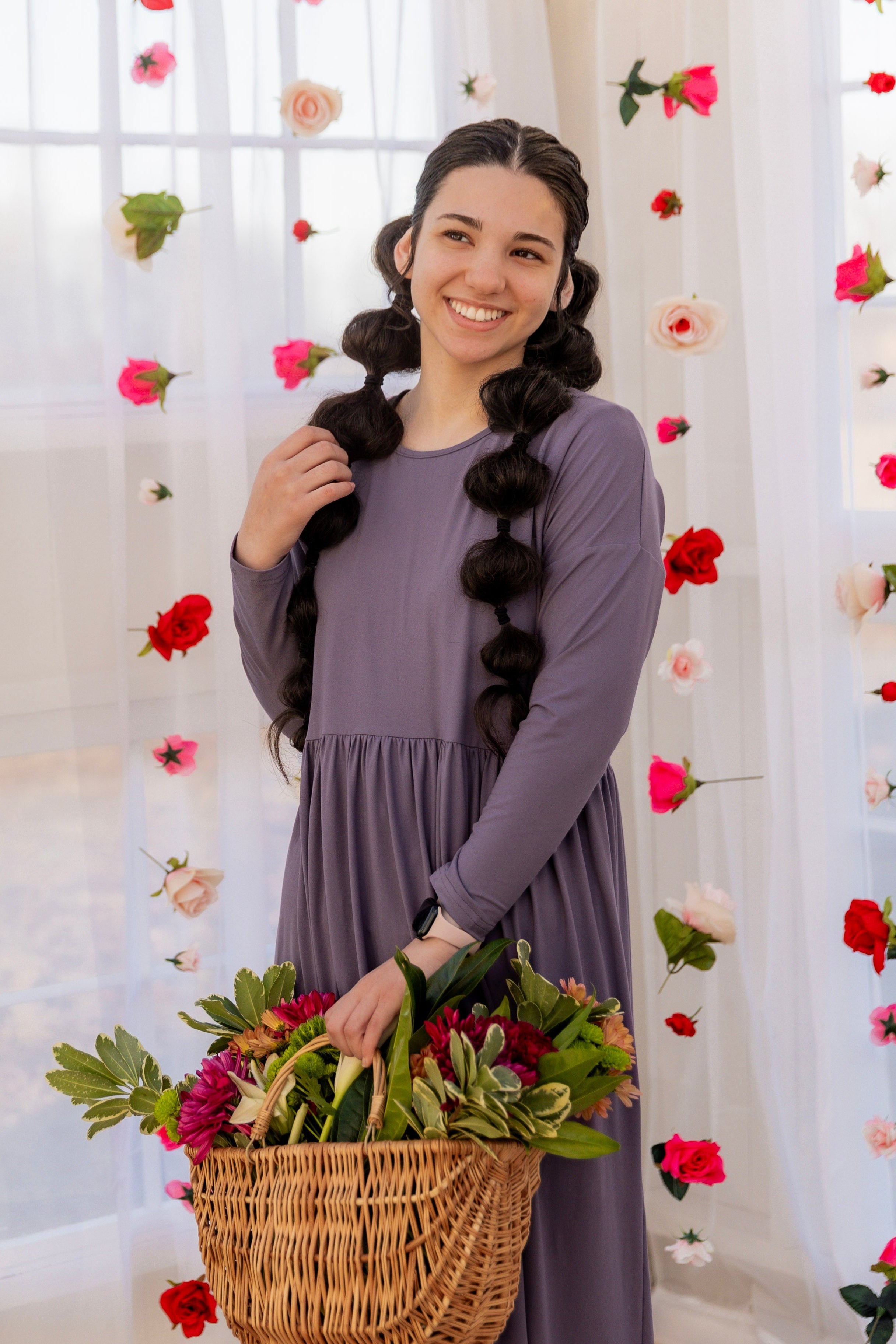 Model wearing the Nuggles® Farah Dress in Purple