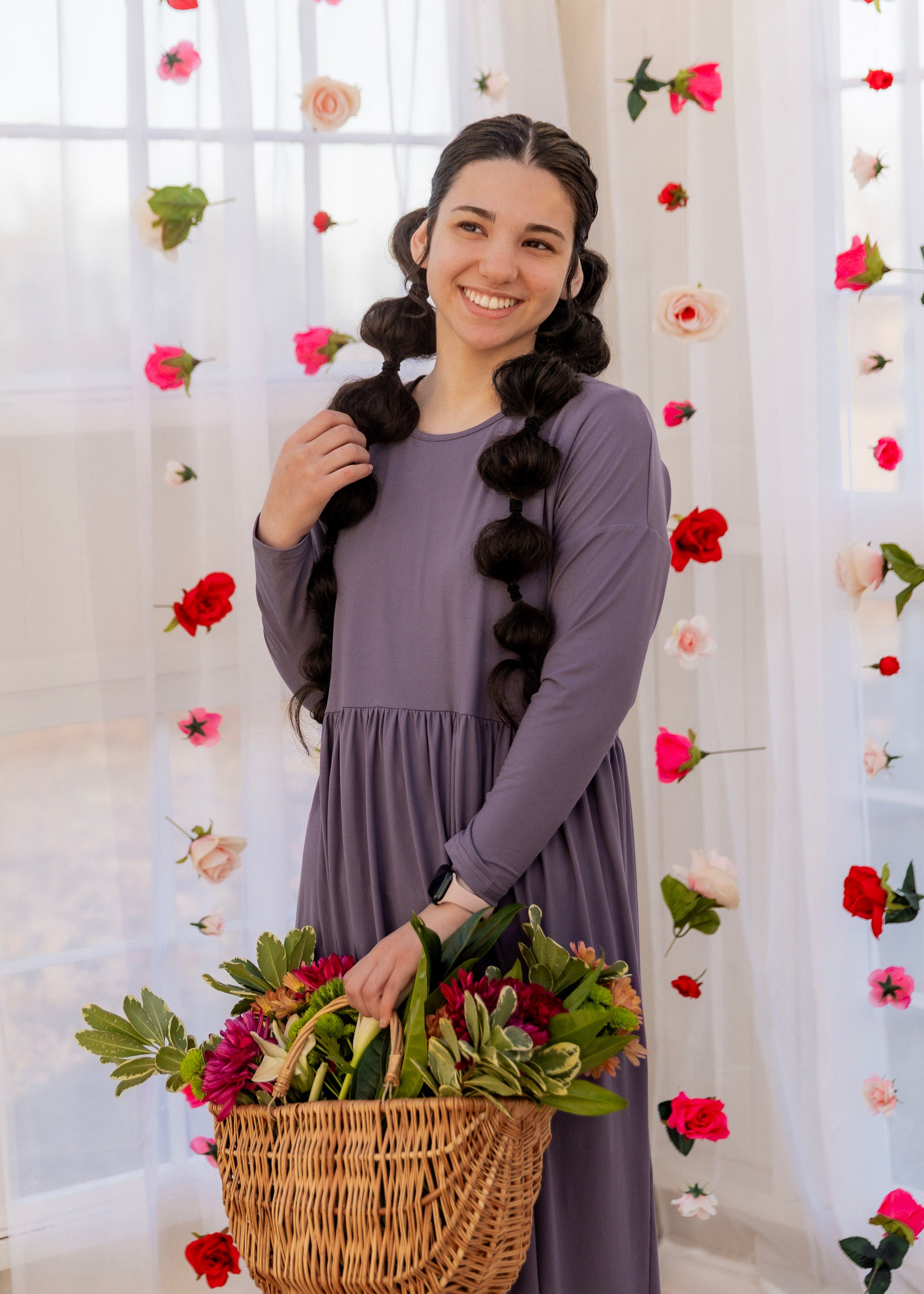 Model wearing the Nuggles® Farah Dress in Purple