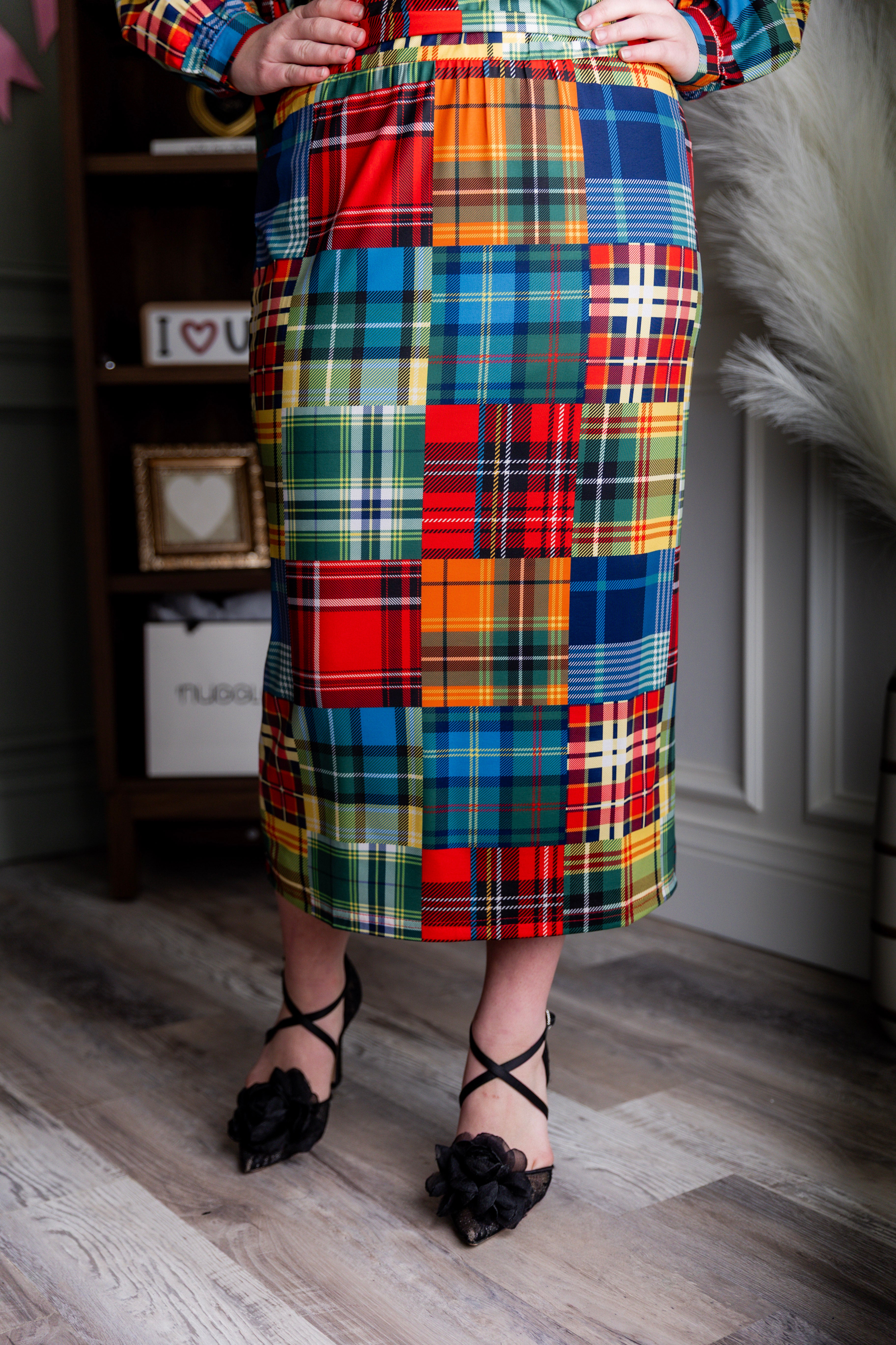 Model wearing modest Nuggles® 31" Lined Pencil Skirt in Patch Plaid