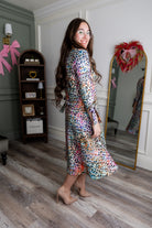 Model wearing Nuggles® Hazel Dress in Cotton Candy Cheetah print modest boutique style.