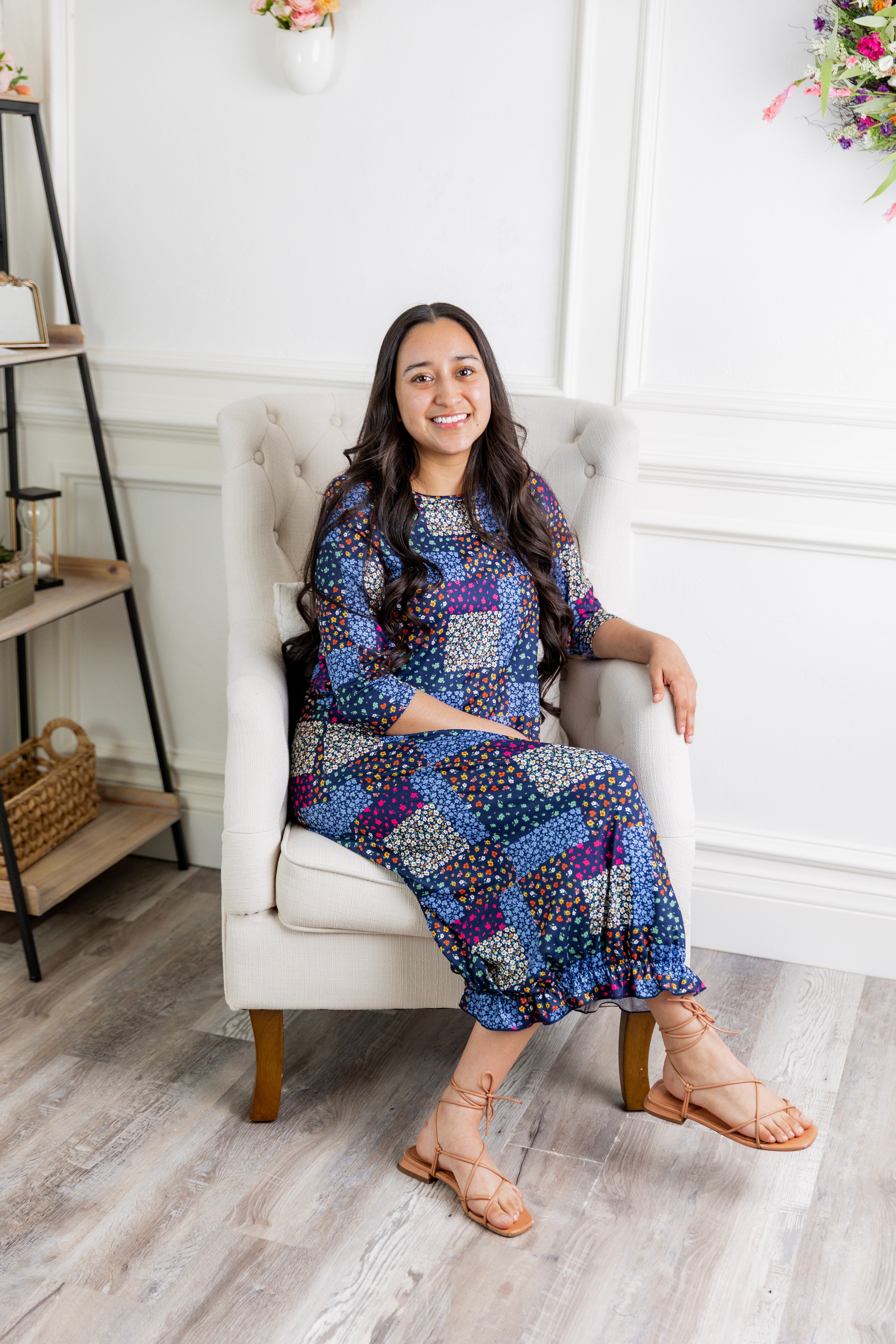 Model wearing our Nuggles® modest Bristol midi dress with 3/4 sleeves and elastic ruffle hem in various prints.