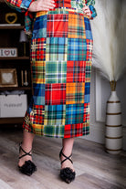 Model wearing modest Nuggles® 31" Lined Pencil Skirt in Patch Plaid