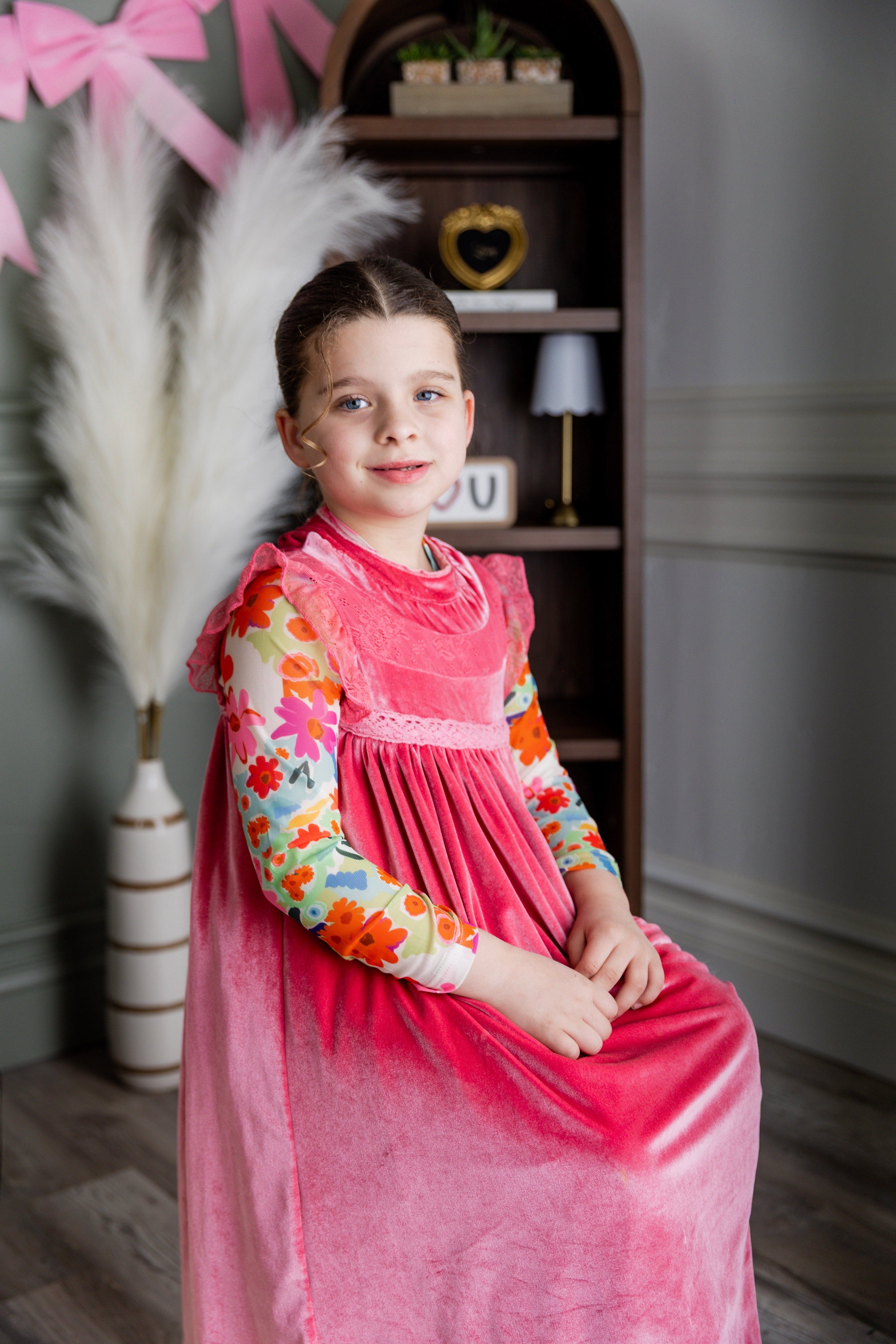 Model wearing Nuggles® Girls' Mesh Tee in Confetti Bloom