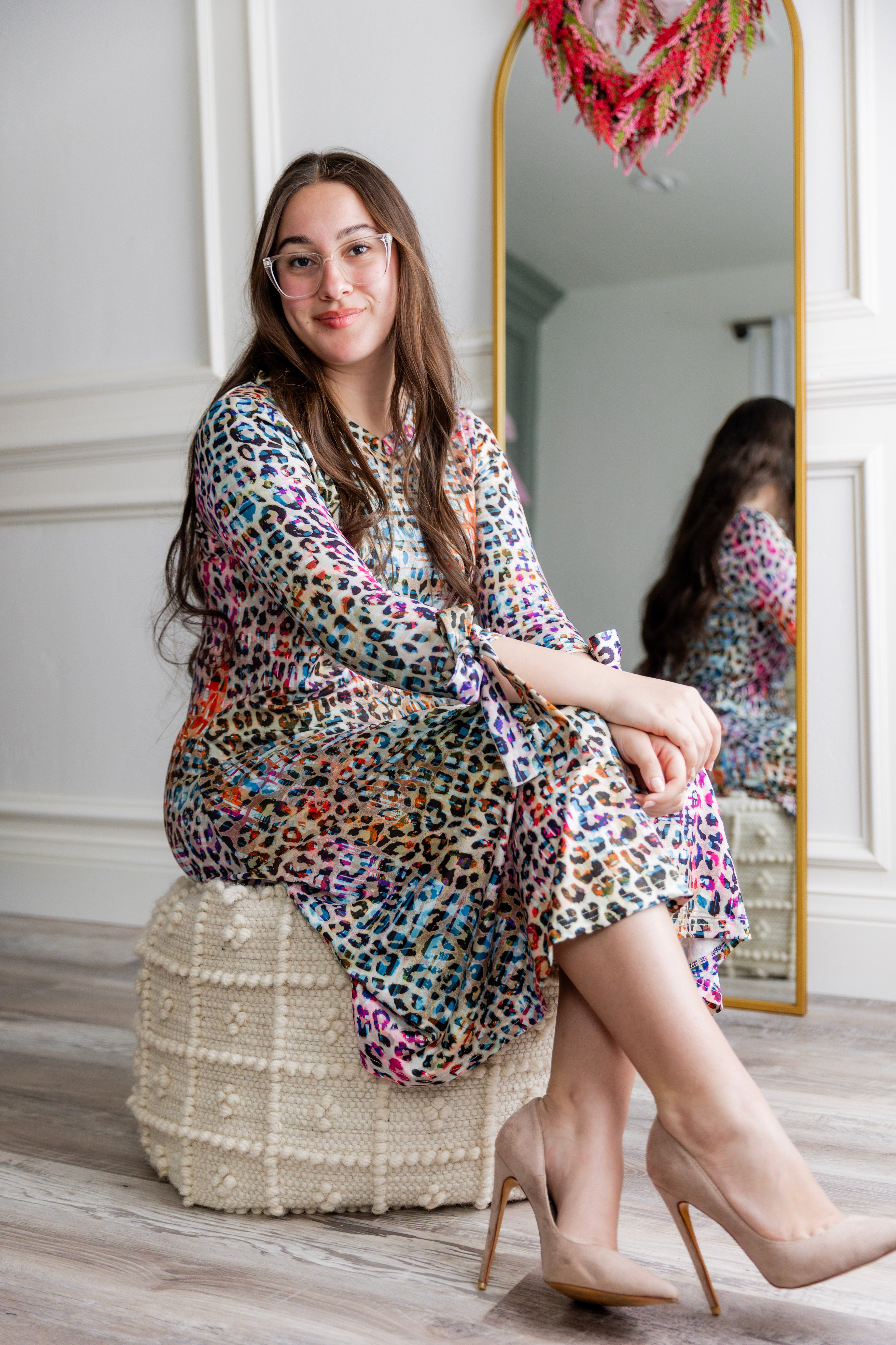 Model wearing Nuggles® Hazel Dress in Cotton Candy Cheetah print modest boutique style.