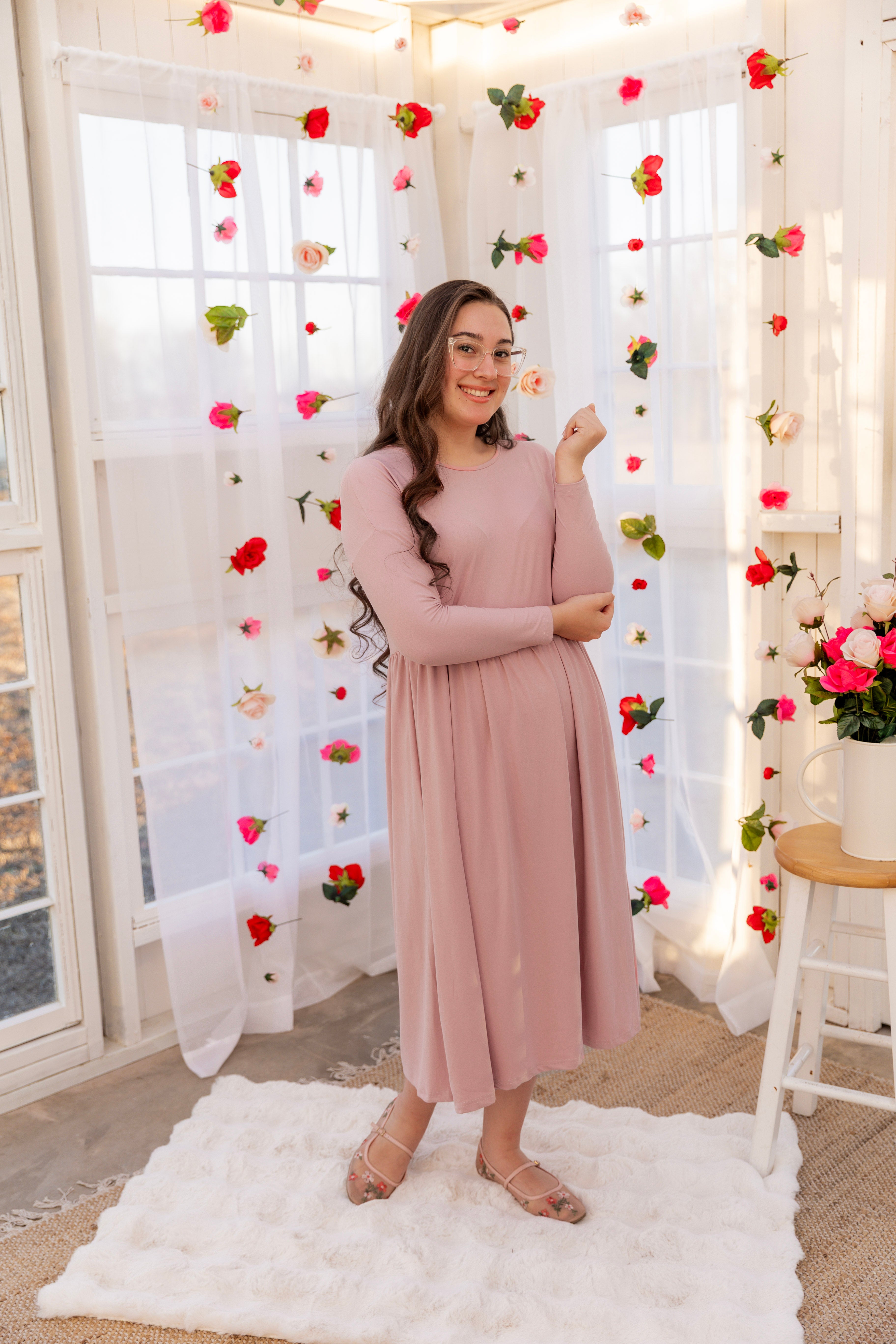 Model wearing the Nuggles® Farah Dress in Baby Pink