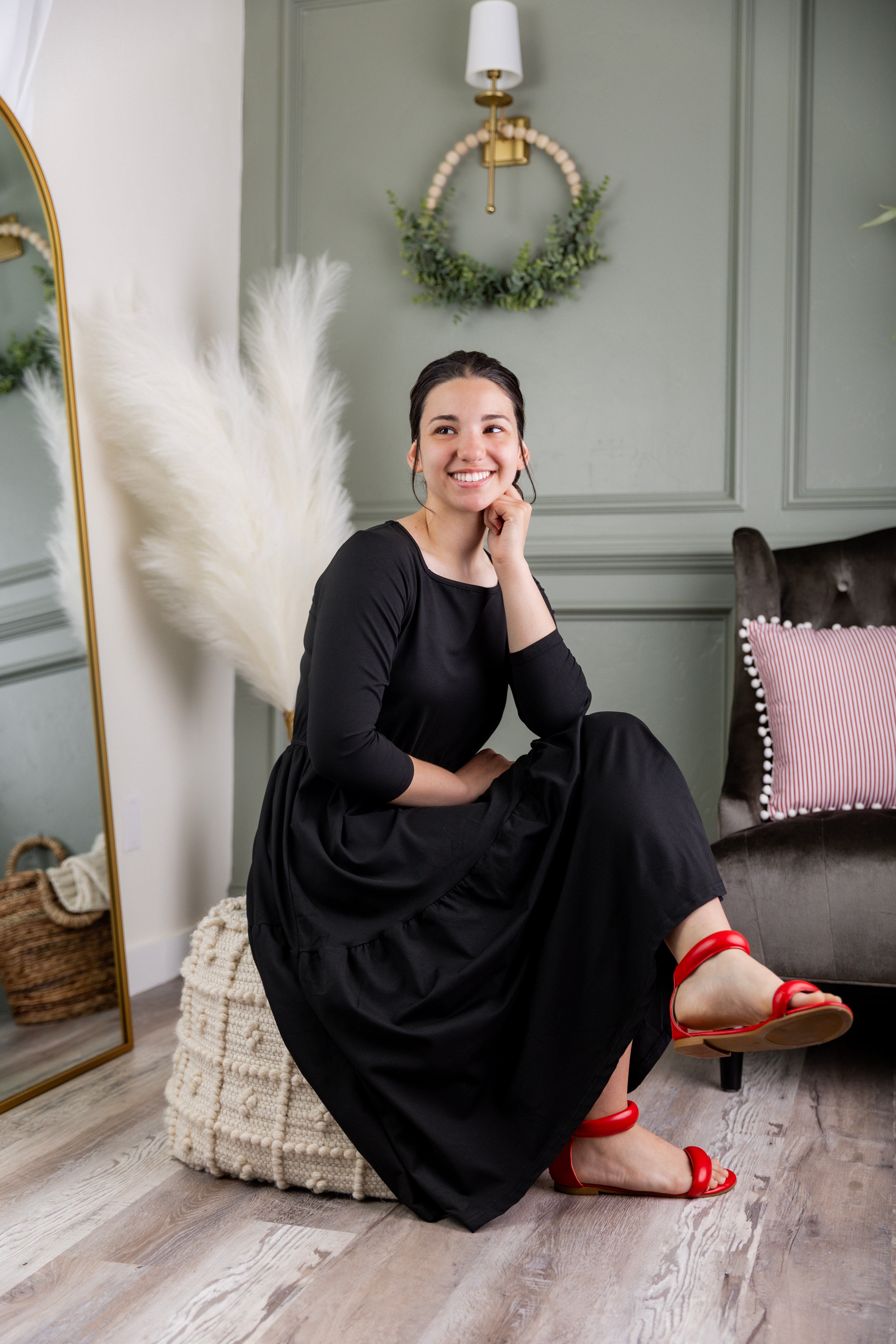 Model wearing Modest Nuggles® Nova Dress in Black