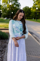 modest long sleeve top with a tie knot and contrasting knit fabrics