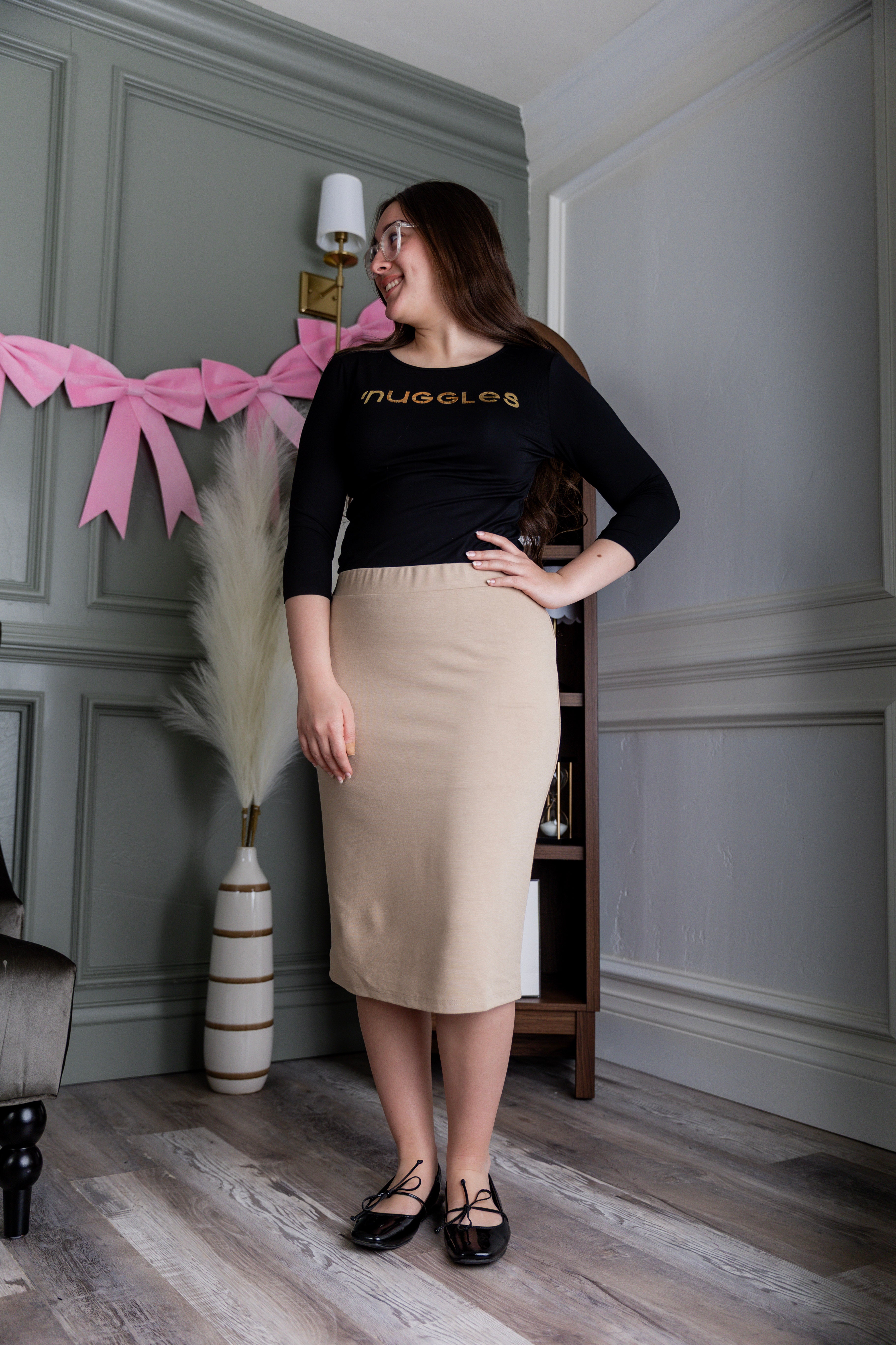 Model wearing Nuggles® 25" Relaxed Skirt in Khaki