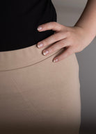 Model wearing Nuggles® 25" Relaxed Skirt in Khaki