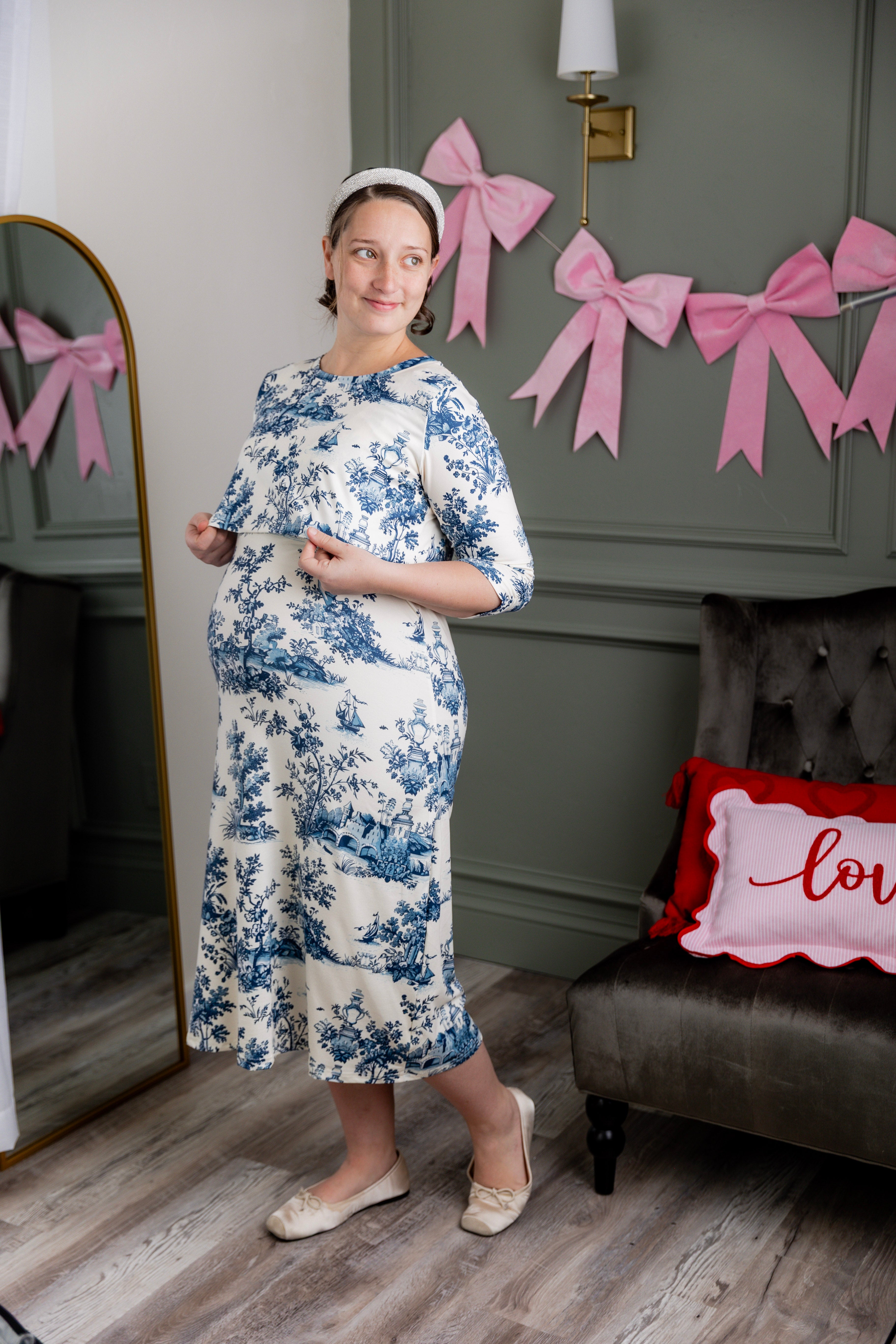 Model wearing Nuggles® Nalani Nursing Dress in Bluebell Toile
