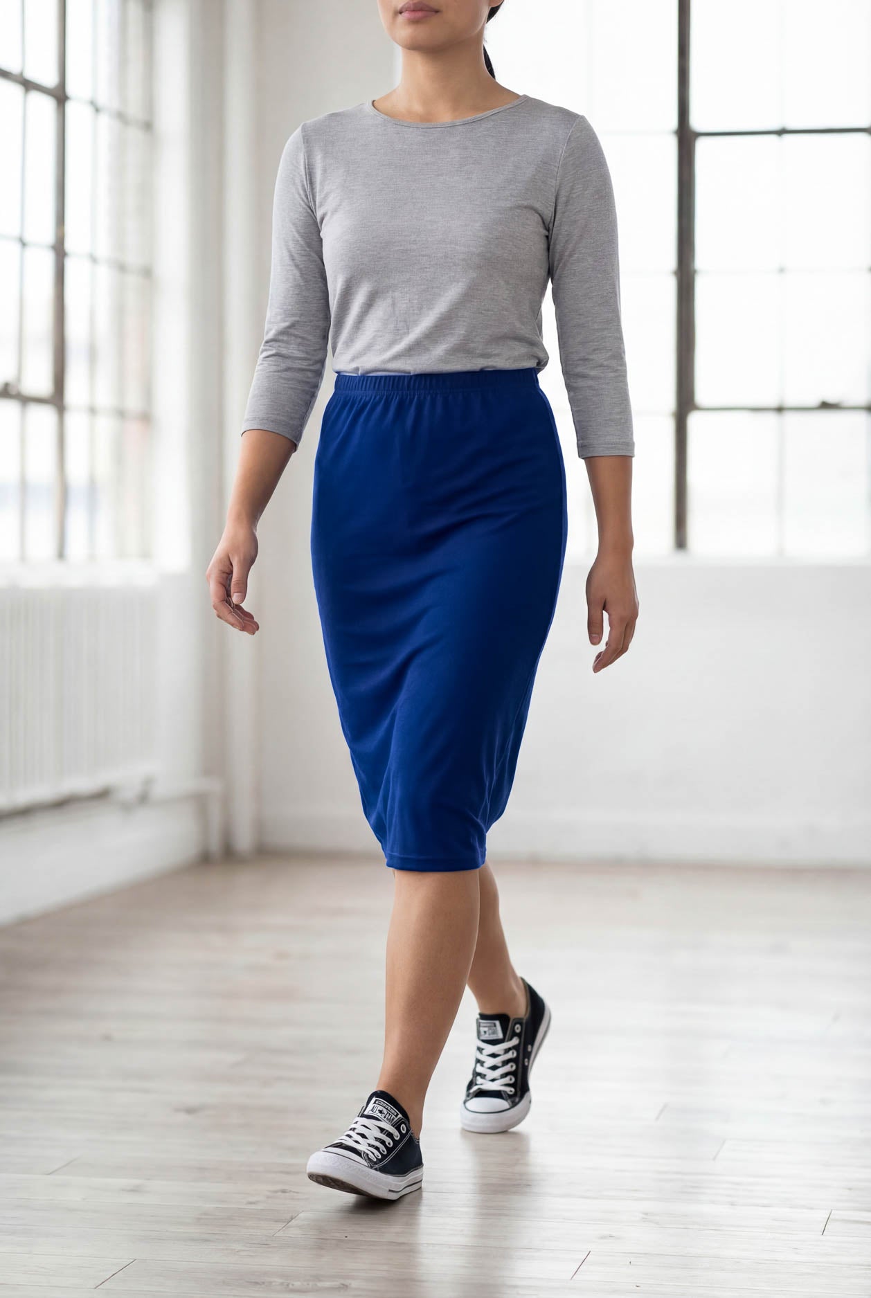 Model wearing Nuggles® 25" Classic Skirt in Dark Royal