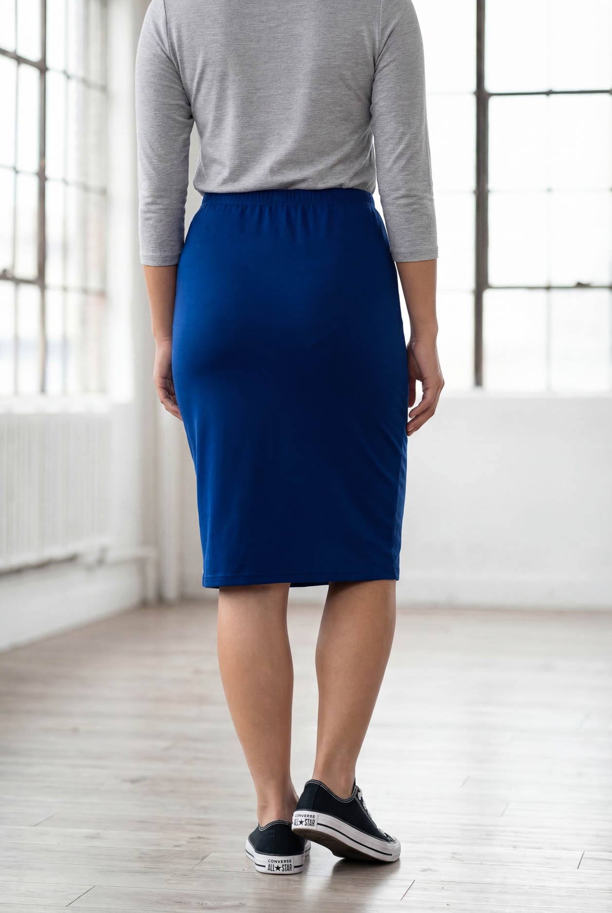 Model wearing Nuggles® 25" Classic Skirt in Dark Royal