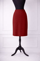 Model wearing Nuggles® 25" Relaxed Skirt in Brick Red