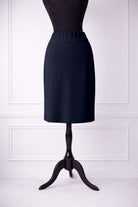 Model wearing Nuggles® 25" Relaxed Skirt in Navy
