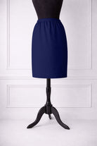 Stock photo of our Nuggles® 25-inch classic skirt elastic waistband and straight silhouette in Dark Royal