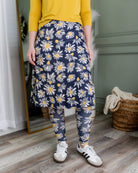 Model wearing Nuggles® Tilly Sport Skirt in Daisy After Dark