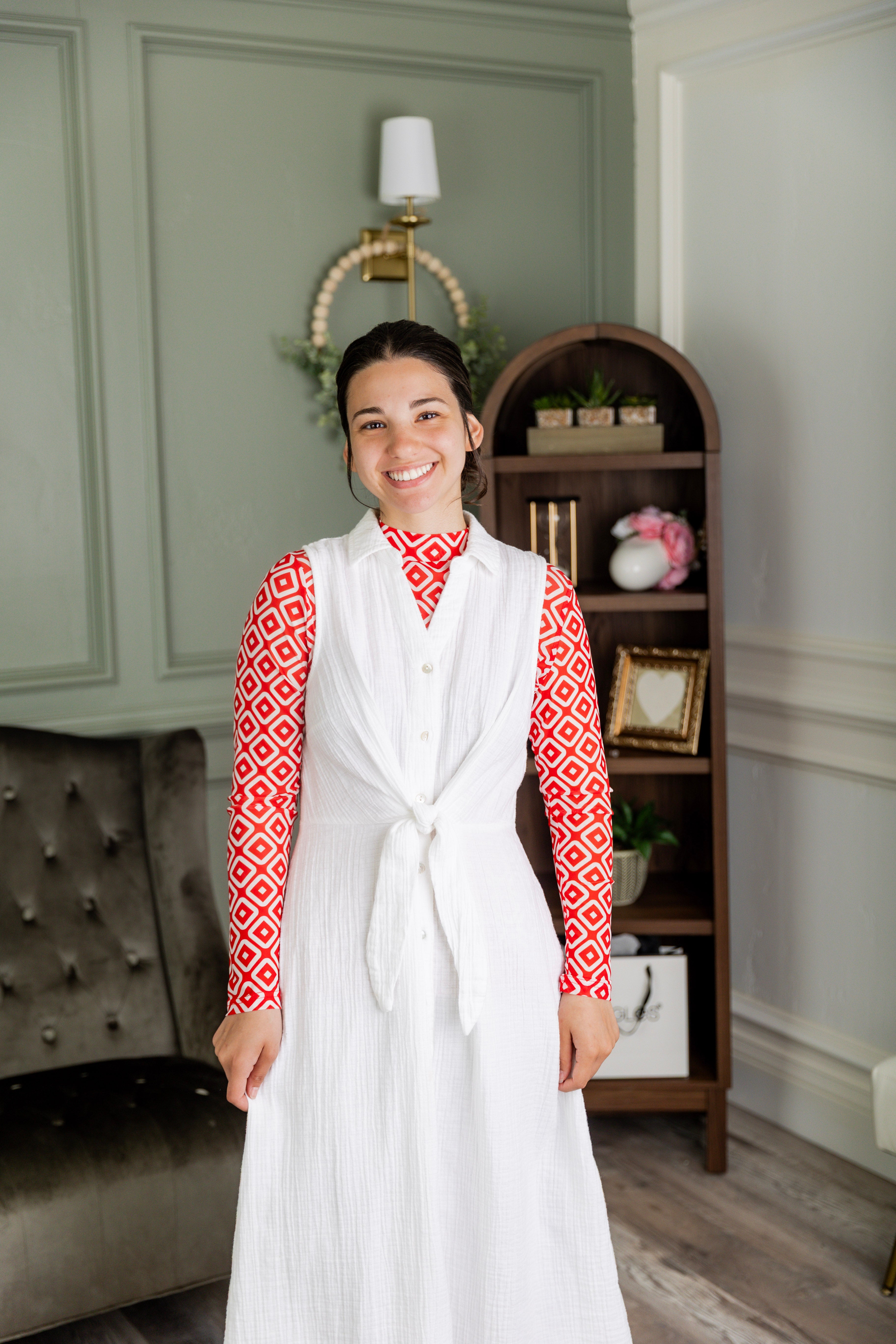 Model wearing Nuggles® Mesh Tee in Candy Apple Geo