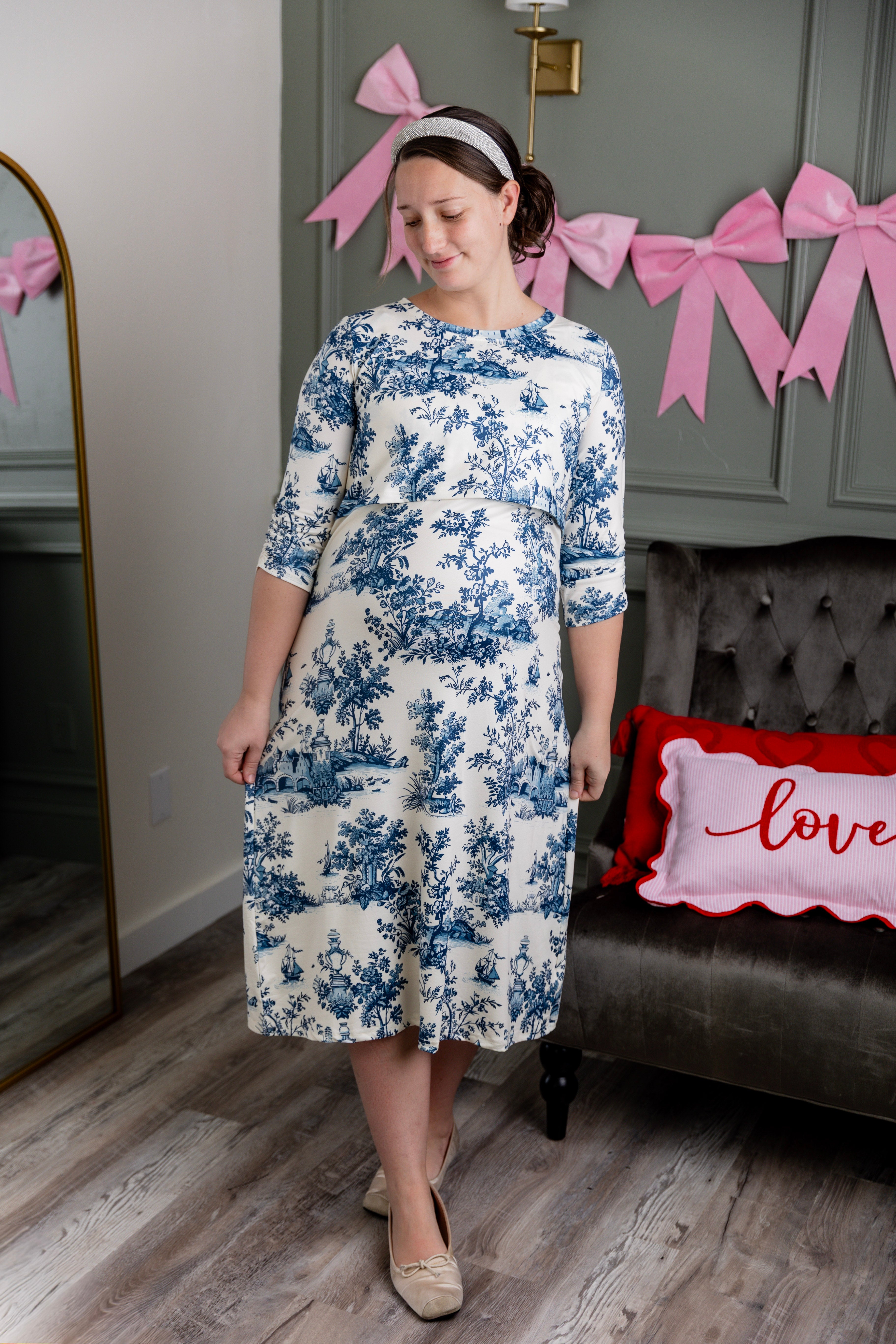 Model wearing Nuggles® Nalani Nursing Dress in Bluebell Toile
