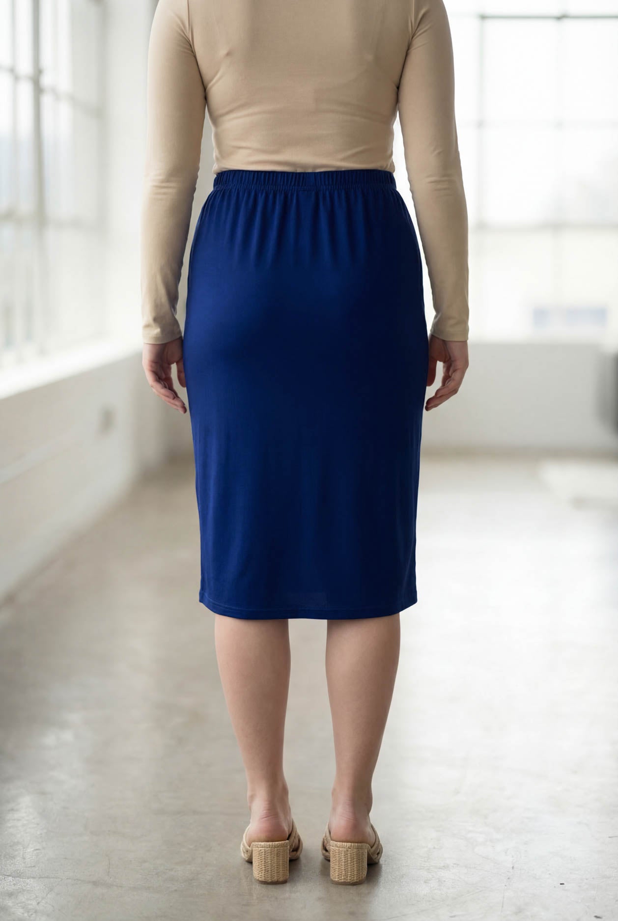 Model wearing Nuggles® 27" Classic Skirt in Dark Royal